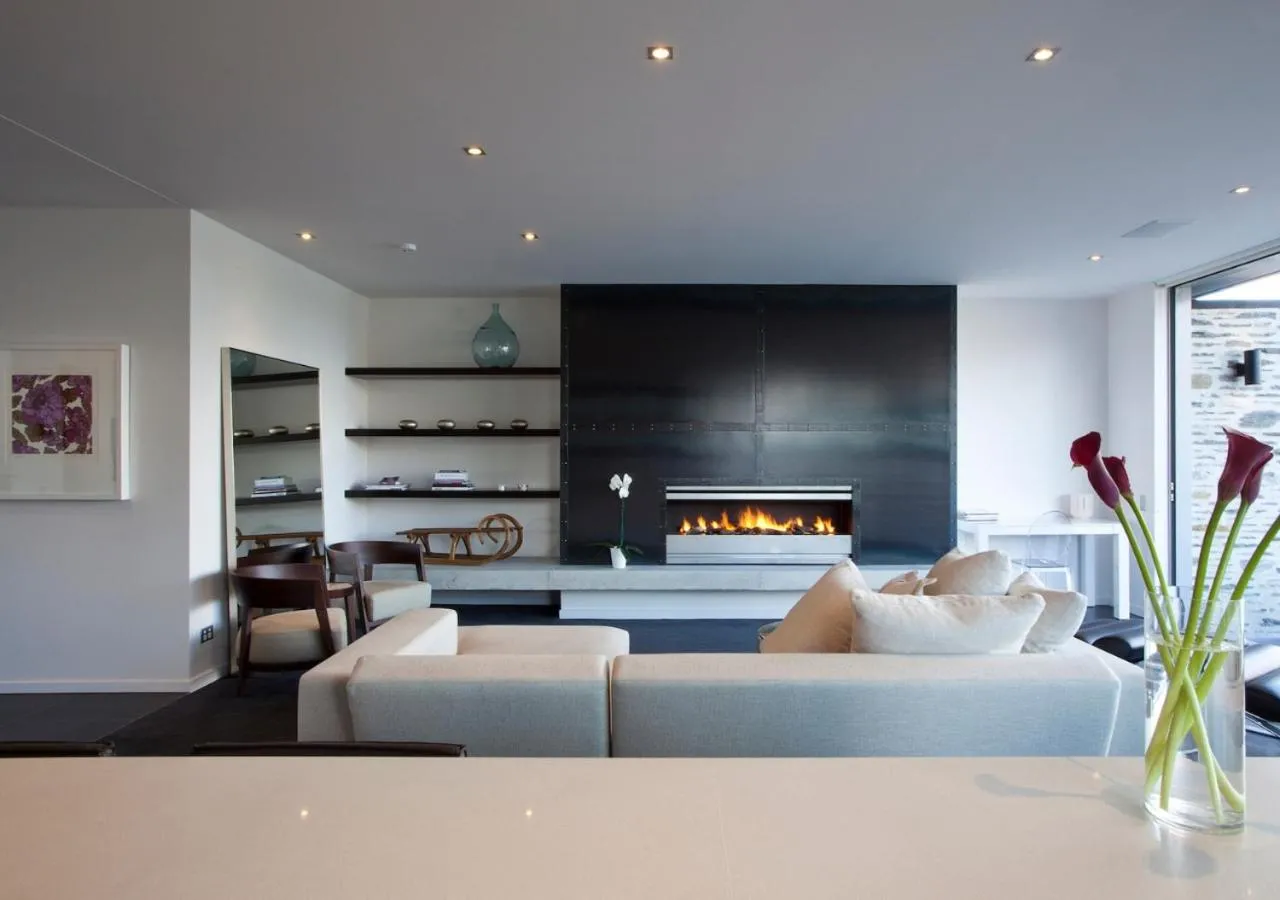 Living room in Kakara Moana by MajorDomo - Lake Views & Spa Pool