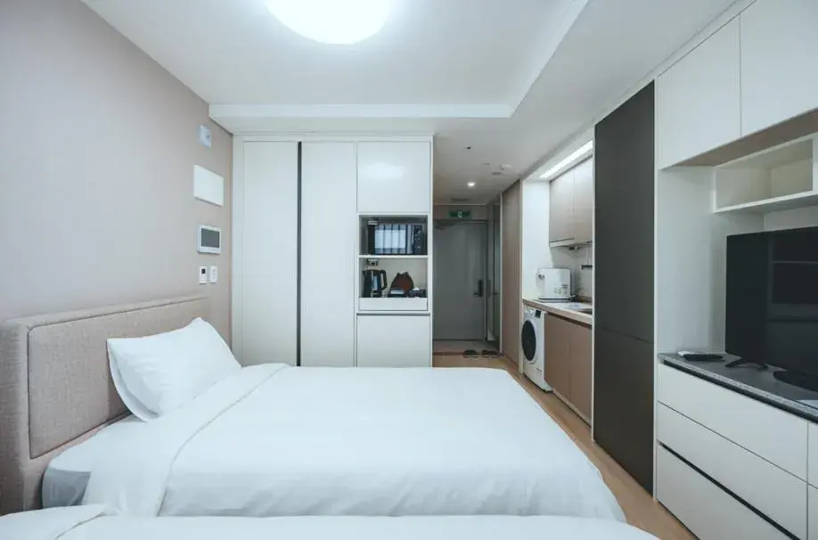 Bed in H Avenue Sasang Station Residence Hotel Bed in H Avenue Sasang Station Residence Hotel