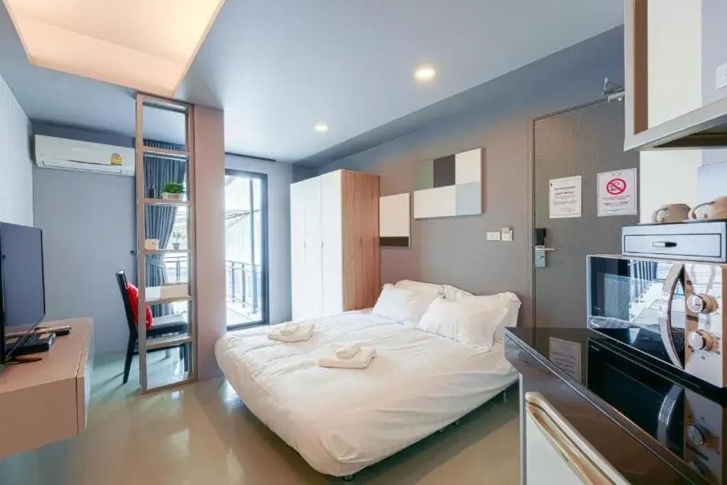 Seating area, Bed in Quite Grove Hotel Seating area, Bed in Quite Grove Hotel