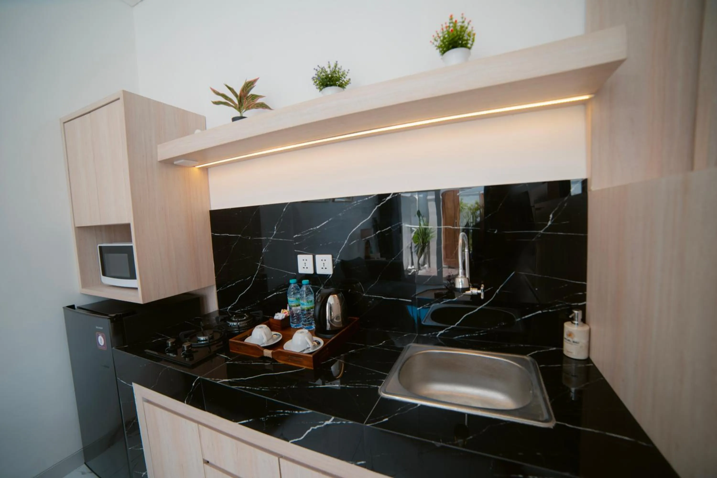 Kitchen or kitchenette in Dikubu Bali Villa and Suites