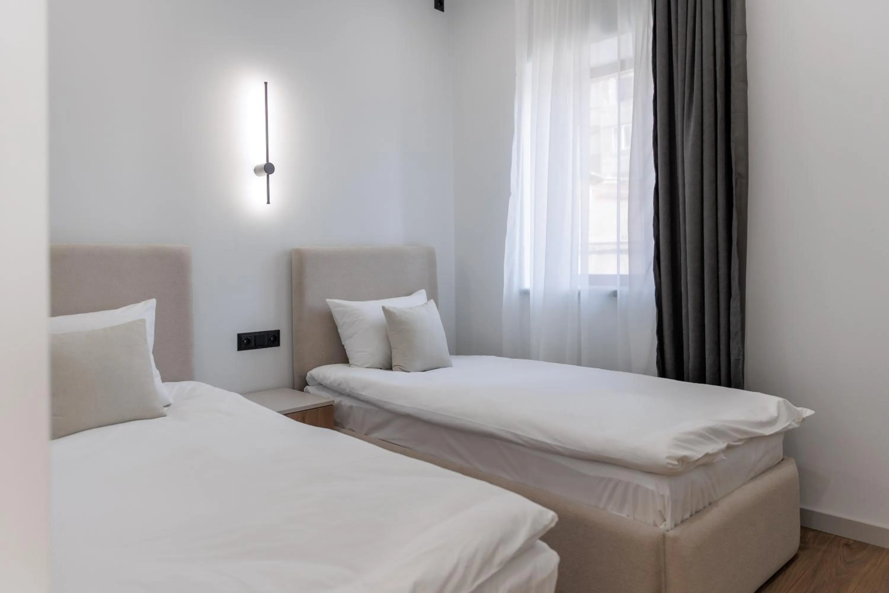 Bed in RIS Central Apartments Yerevan