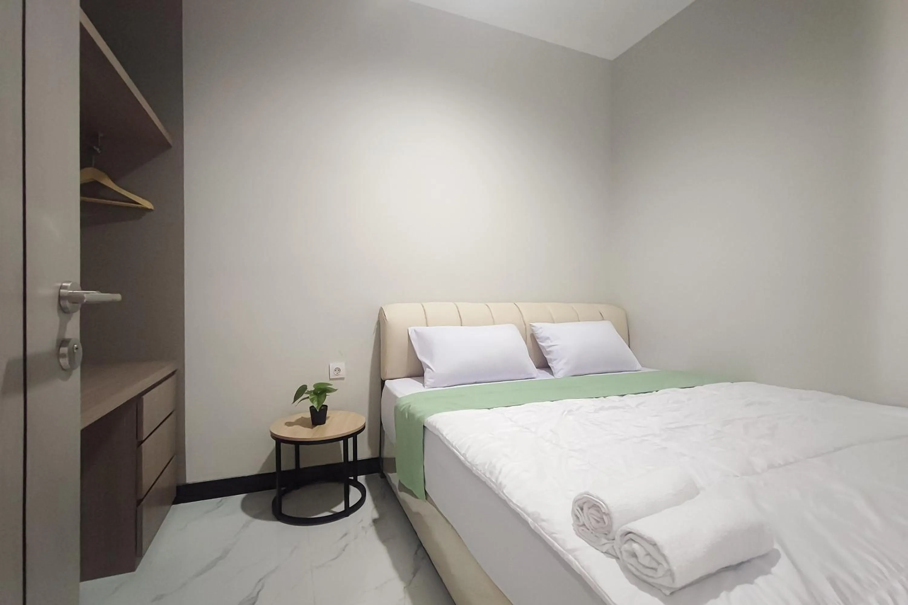 Bedroom in Urbanview Hotel at Pesona Guest House Jambi