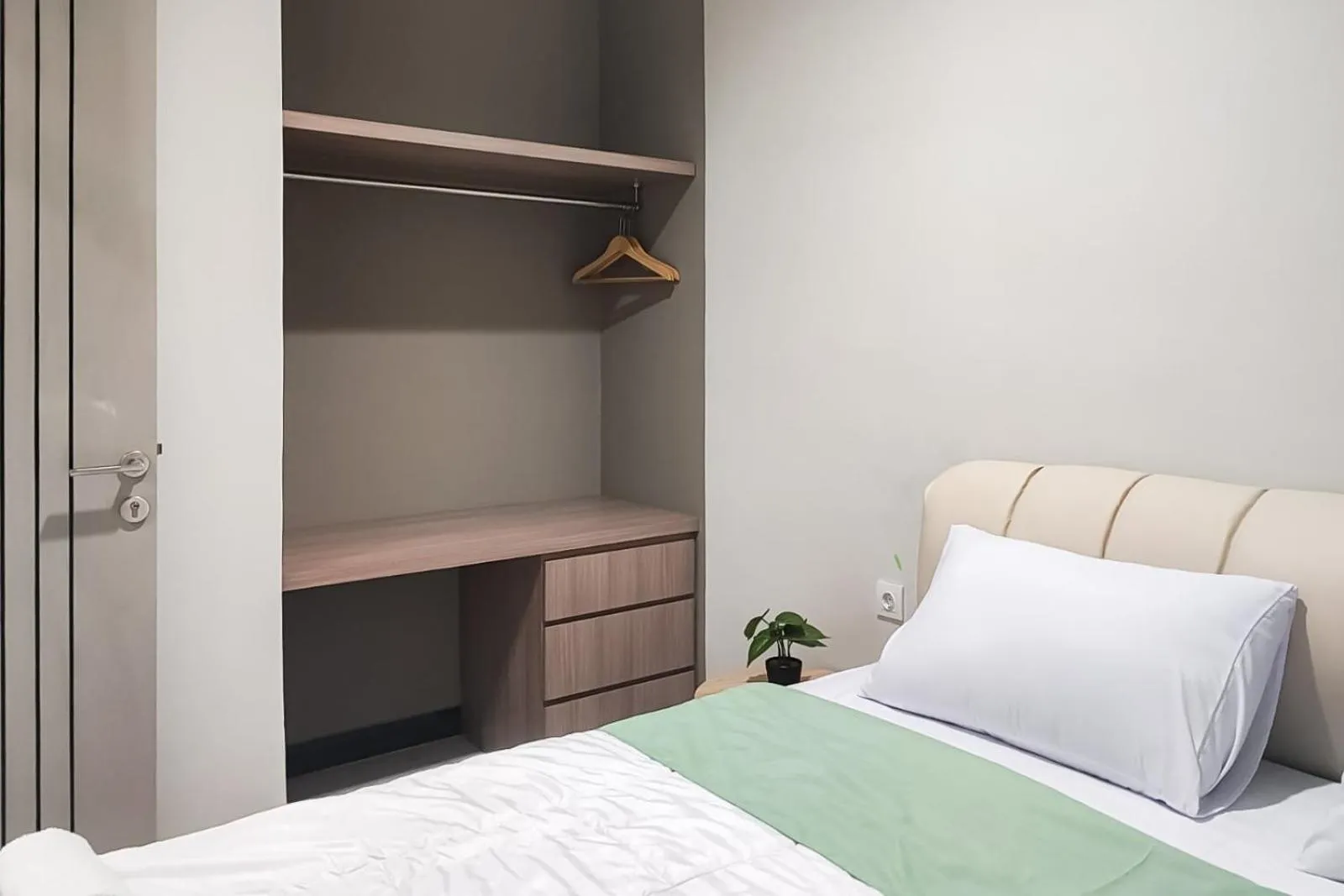 Bedroom in Urbanview Hotel at Pesona Guest House Jambi