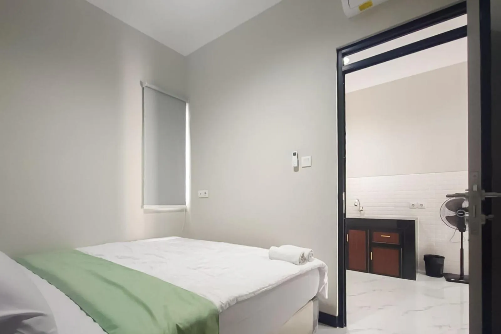 Bedroom in Urbanview Hotel at Pesona Guest House Jambi