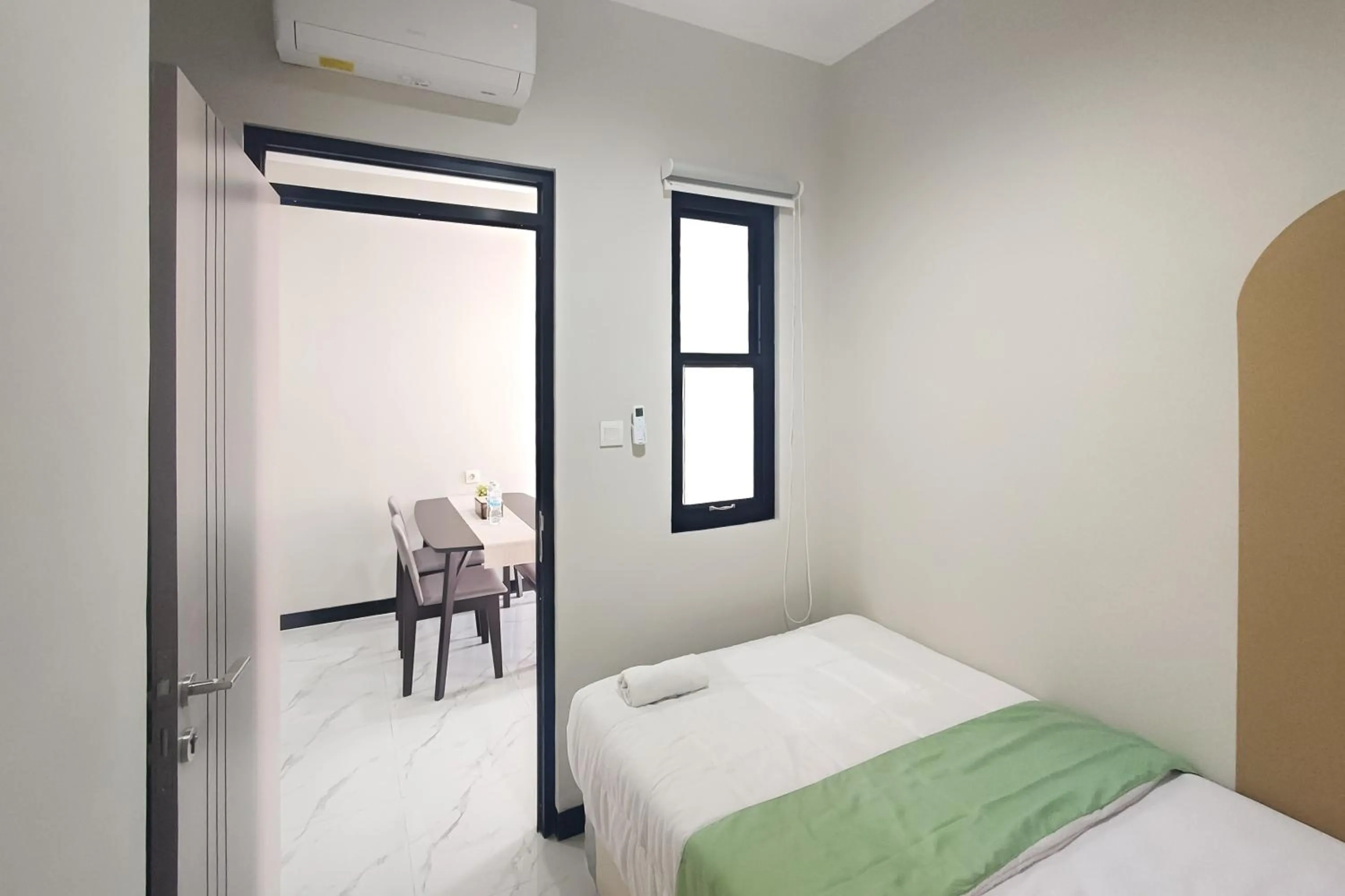 Bedroom in Urbanview Hotel at Pesona Guest House Jambi