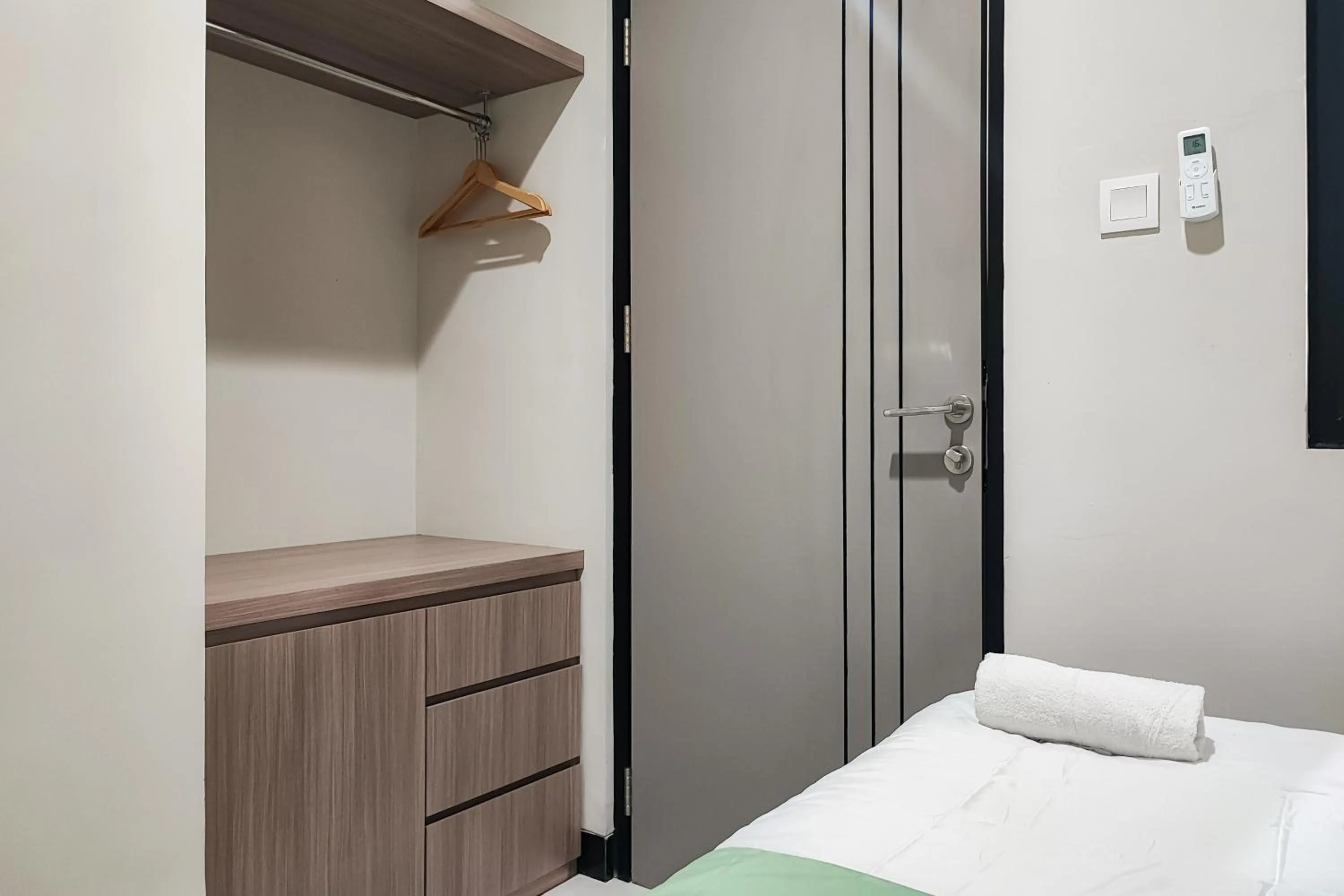 Bedroom in Urbanview Hotel at Pesona Guest House Jambi