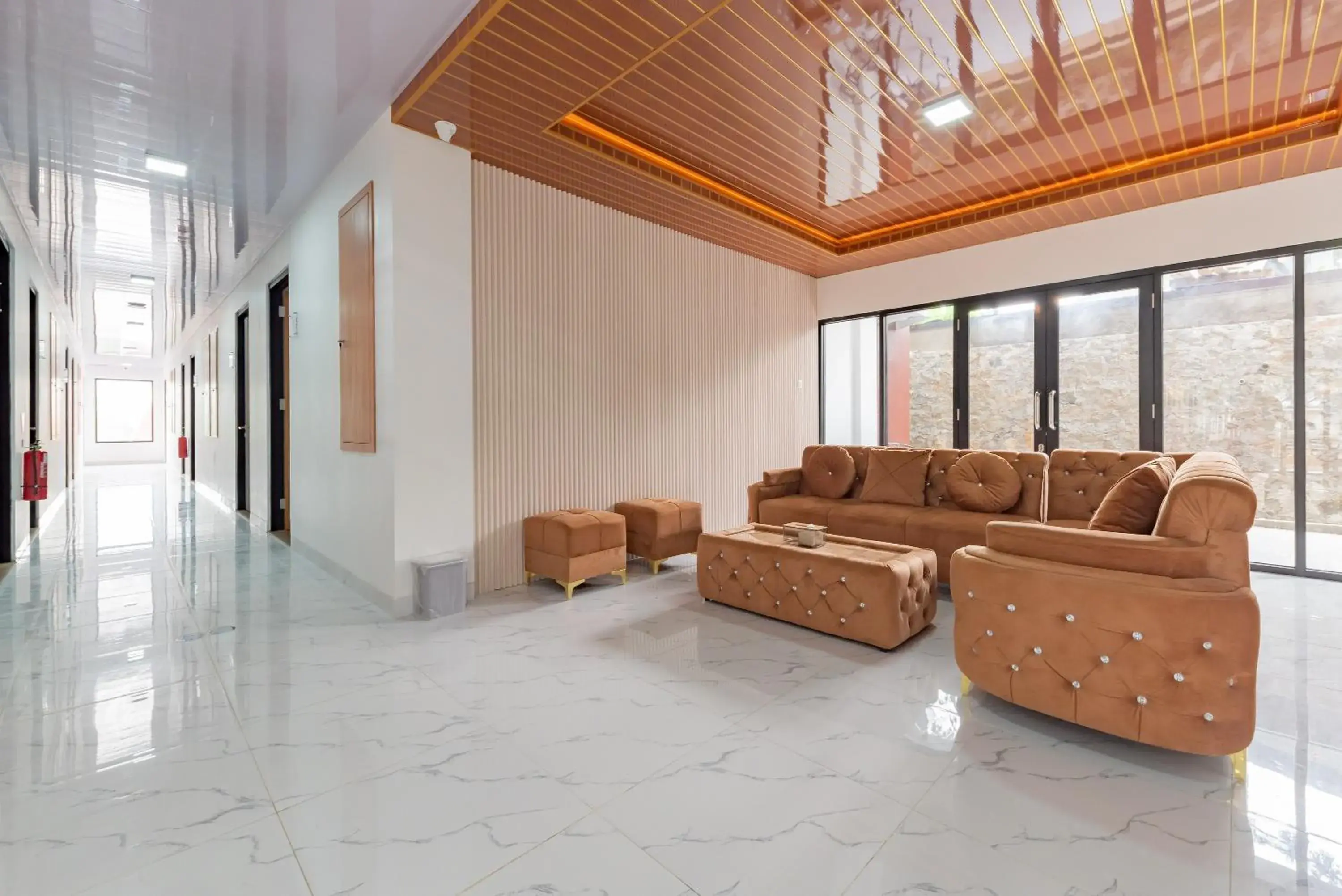 Seating area in Urbanview Hotel Inkoppabri Cisarua Puncak Seating area in Urbanview Hotel Inkoppabri Cisarua Puncak