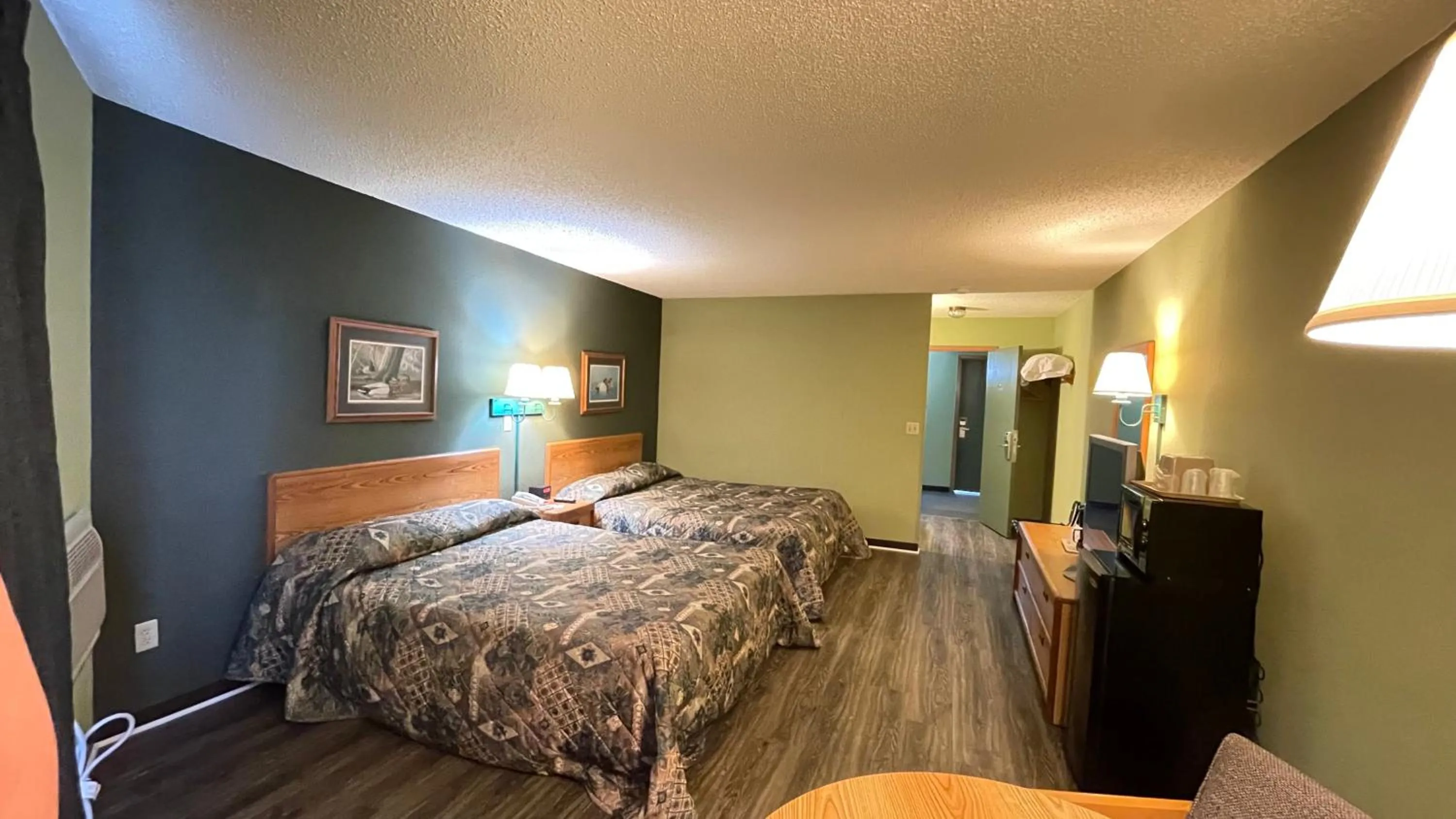 Bed in Harbor Lights Lodge