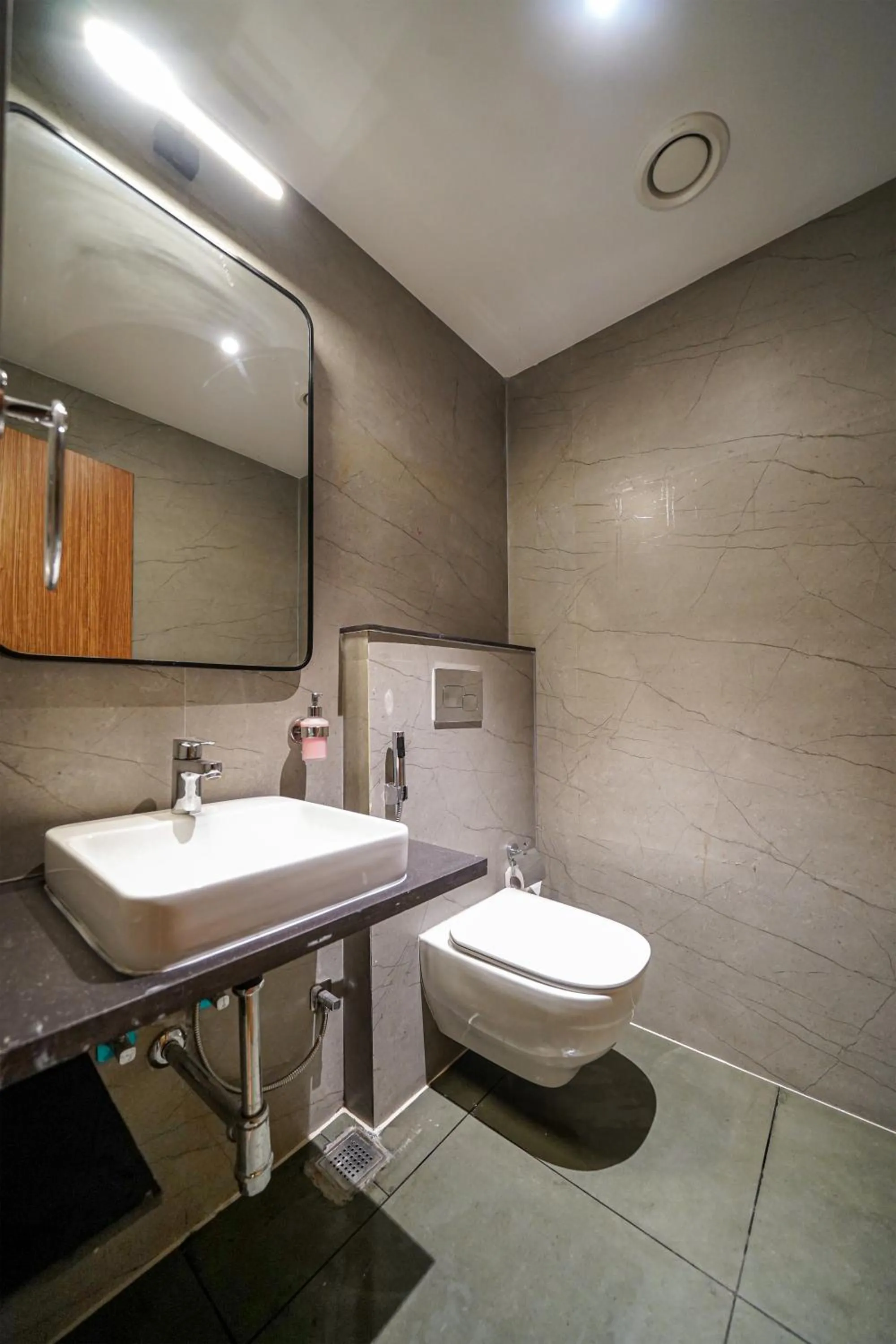 Toilet in Olive Hotel Benz Circle, Vijayawada by Embassy Group