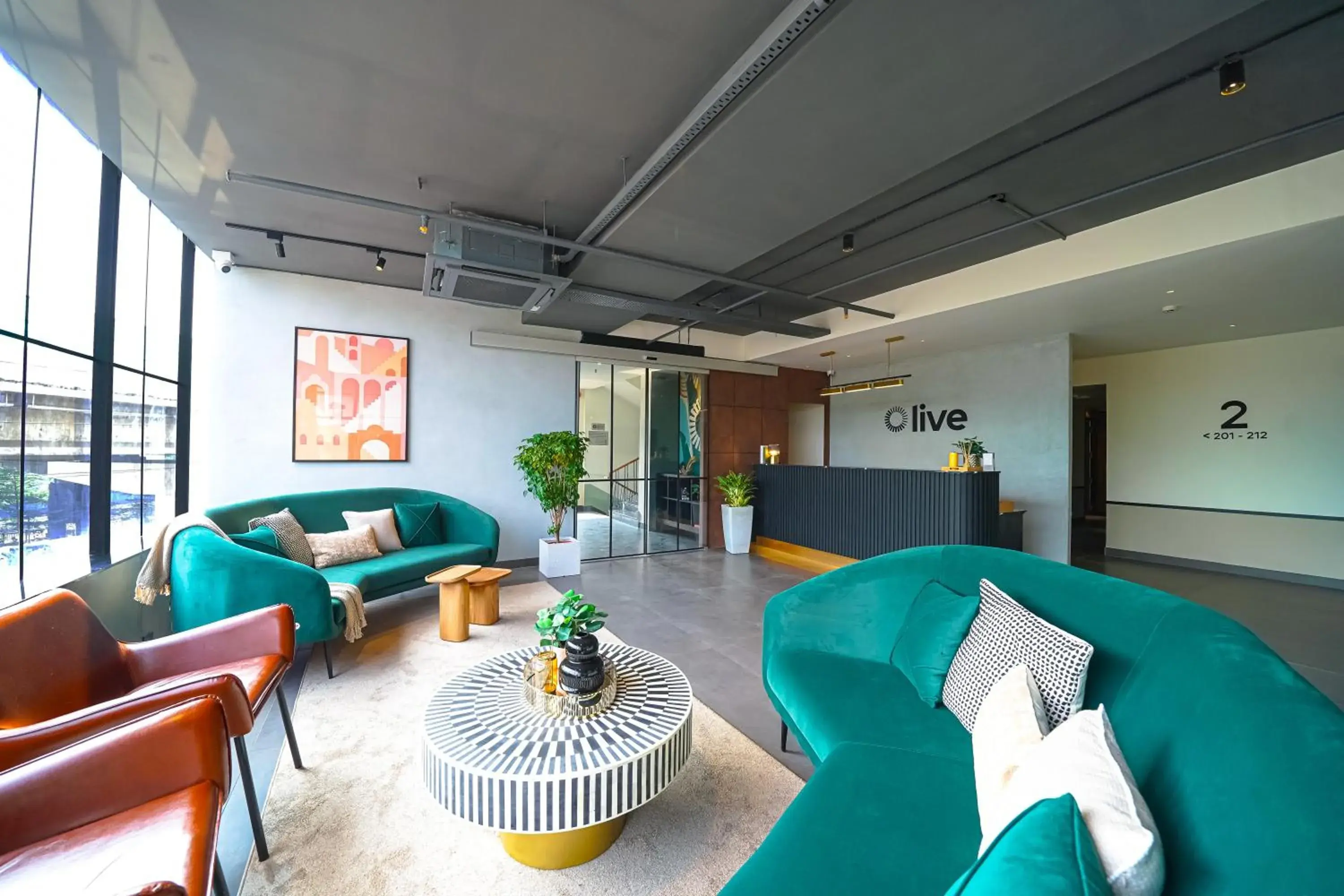 Lobby or reception in Olive Hotel Benz Circle, Vijayawada by Embassy Group Lobby or reception in Olive Hotel Benz Circle, Vijayawada by Embassy Group