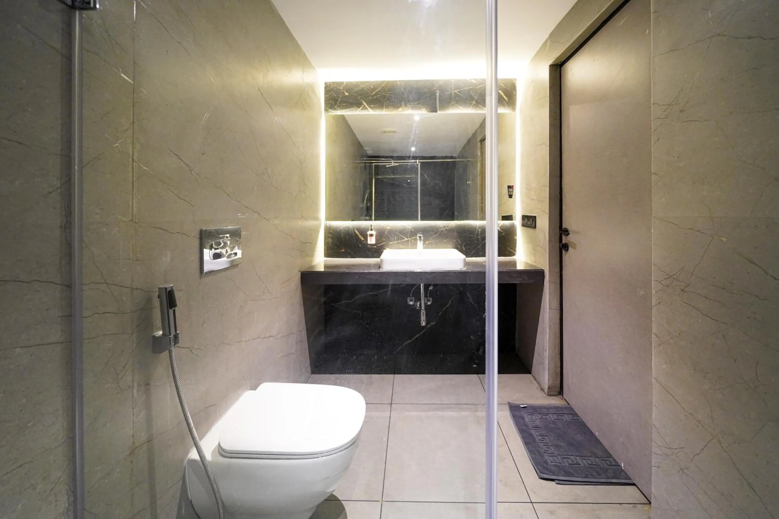 Bathroom in Olive Hotel Benz Circle, Vijayawada by Embassy Group