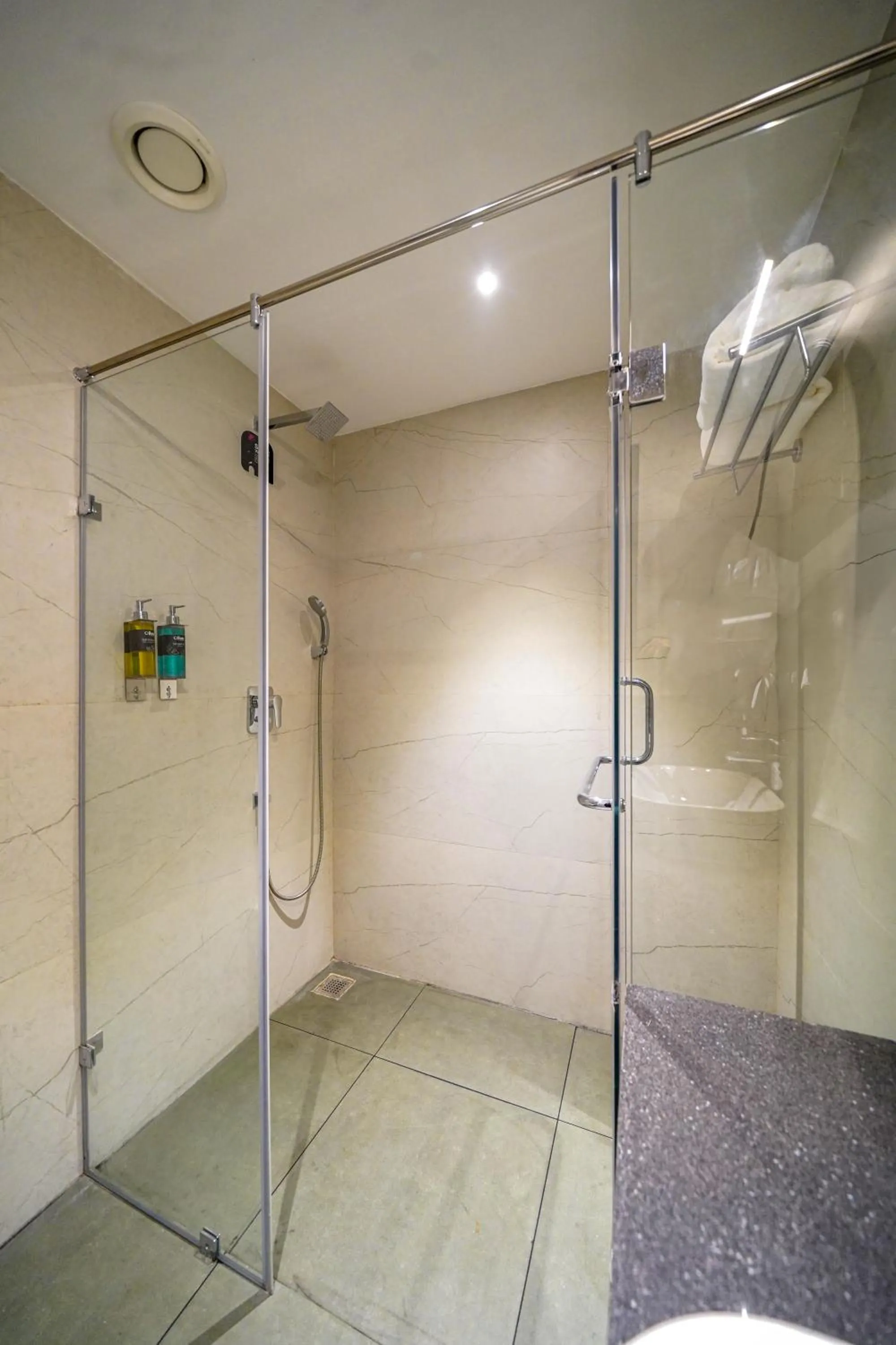 Shower in Olive Hotel Benz Circle, Vijayawada by Embassy Group