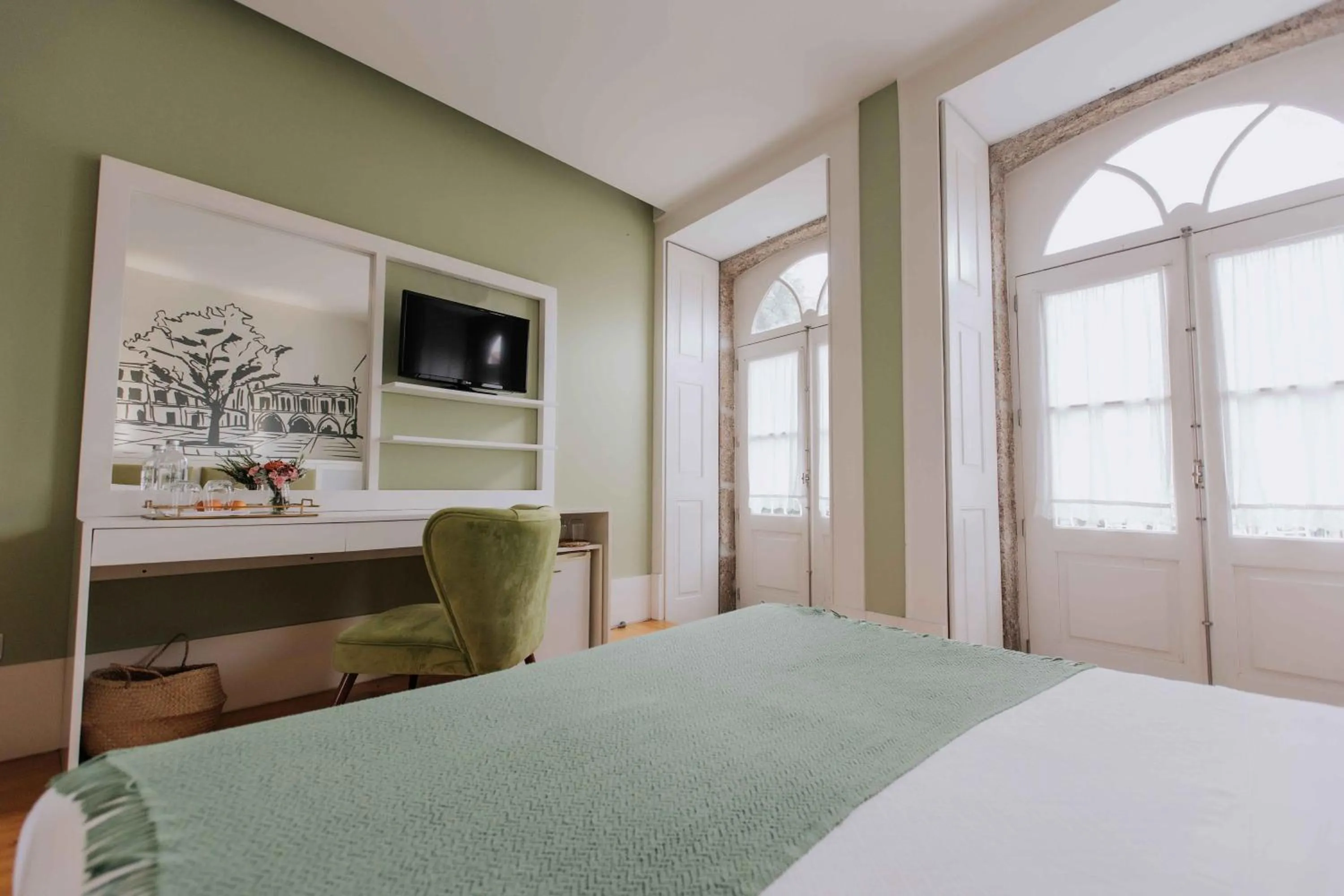 Bed in Trovador Guest House