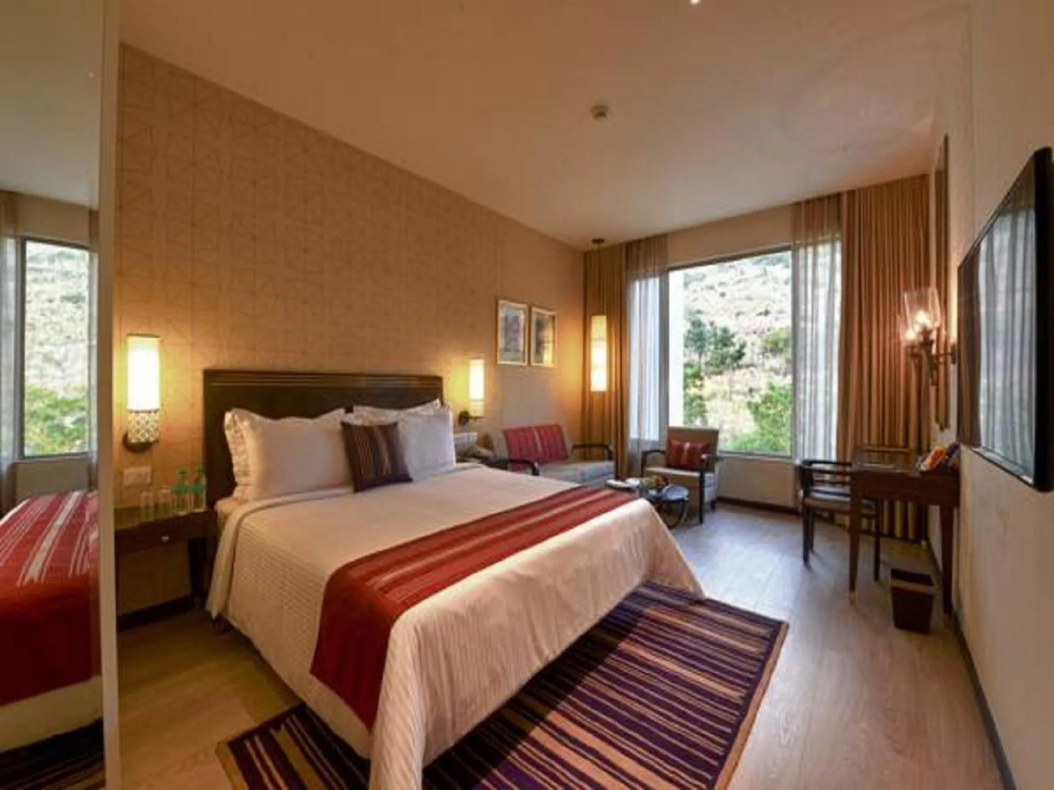 Photo of the whole room, Bed in Marasa Sarovar Premiere