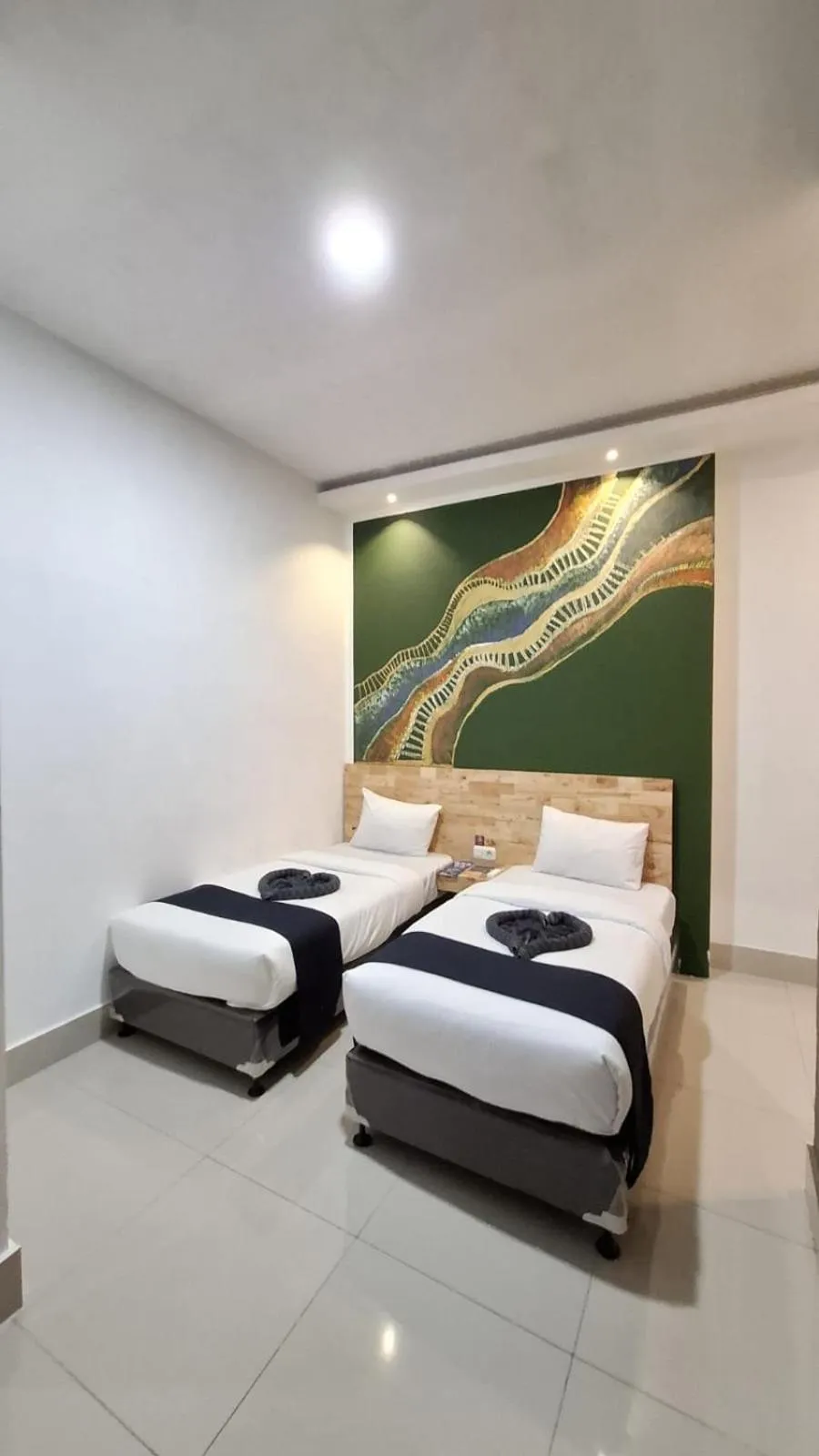 Bed in D'Hills Hotel