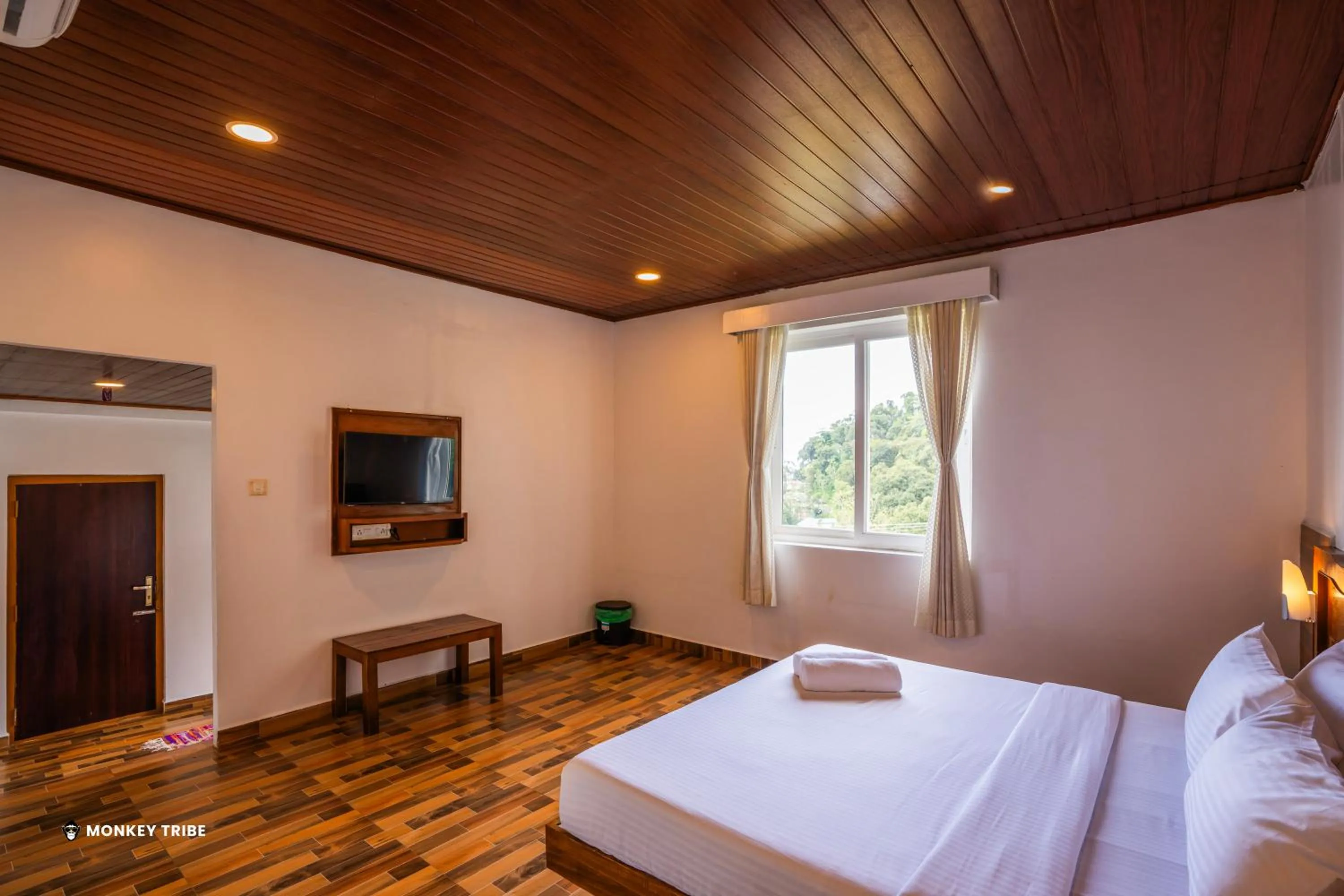 Bed in Monkey Tribe Munnar