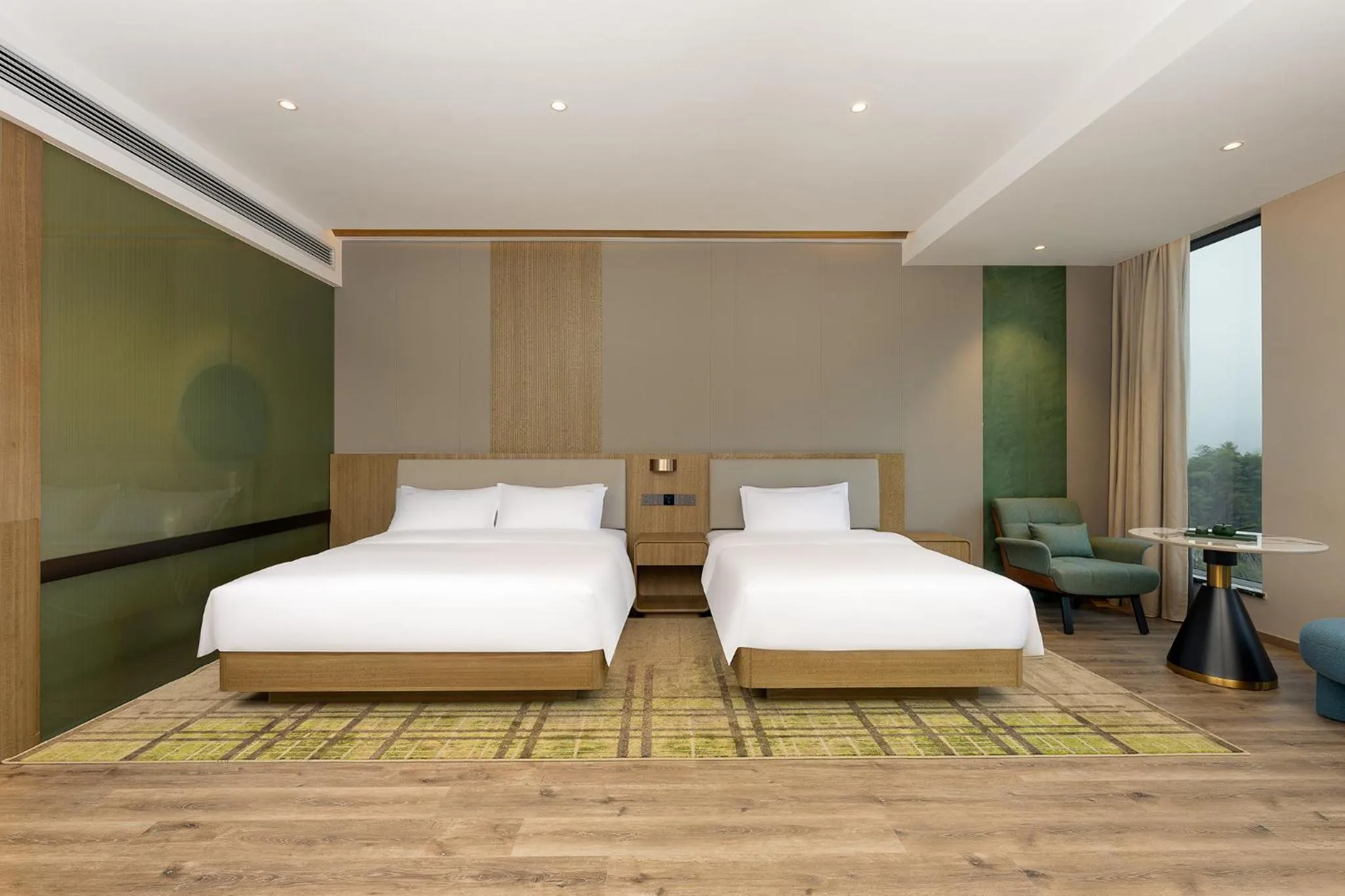 Living room, Bed in Holiday Inn Jiuhua Mountain Hot Spring by IHG