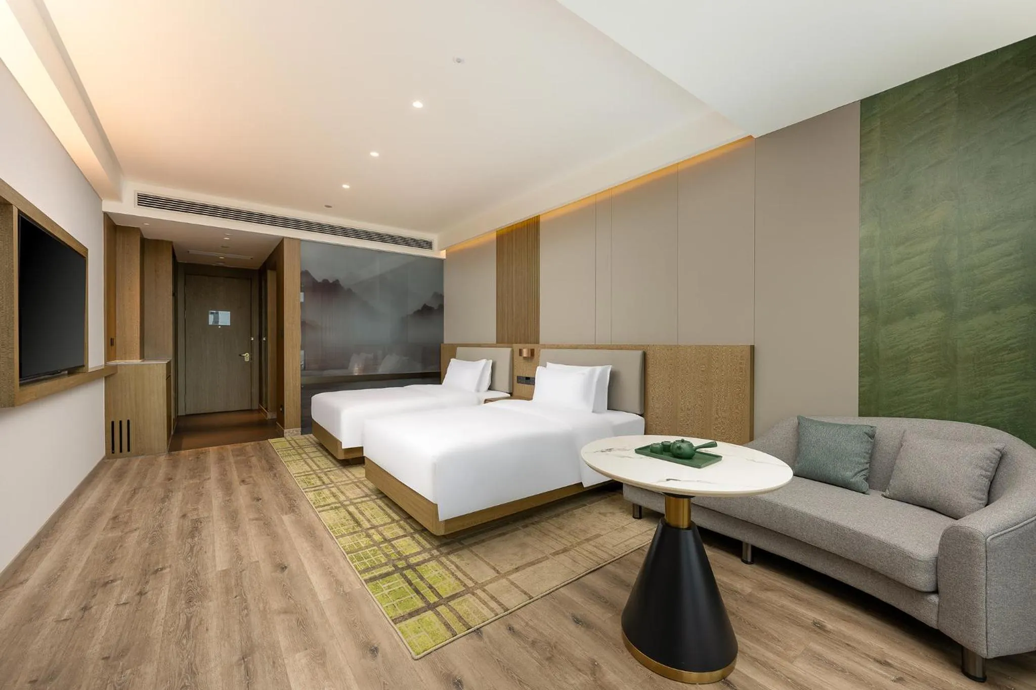 Seating area, Bed in Holiday Inn Jiuhua Mountain Hot Spring by IHG