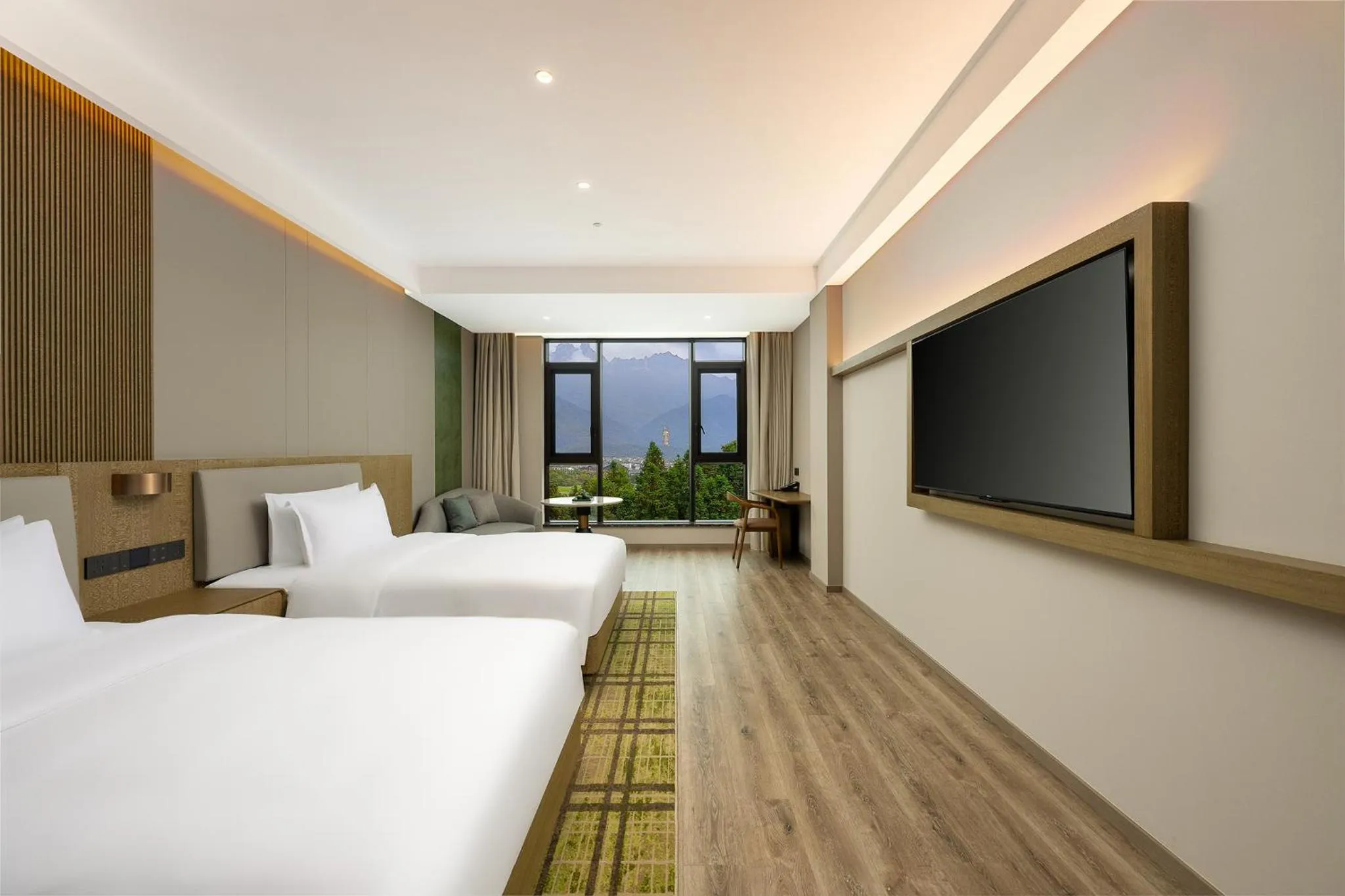 Seating area, Bed in Holiday Inn Jiuhua Mountain Hot Spring by IHG