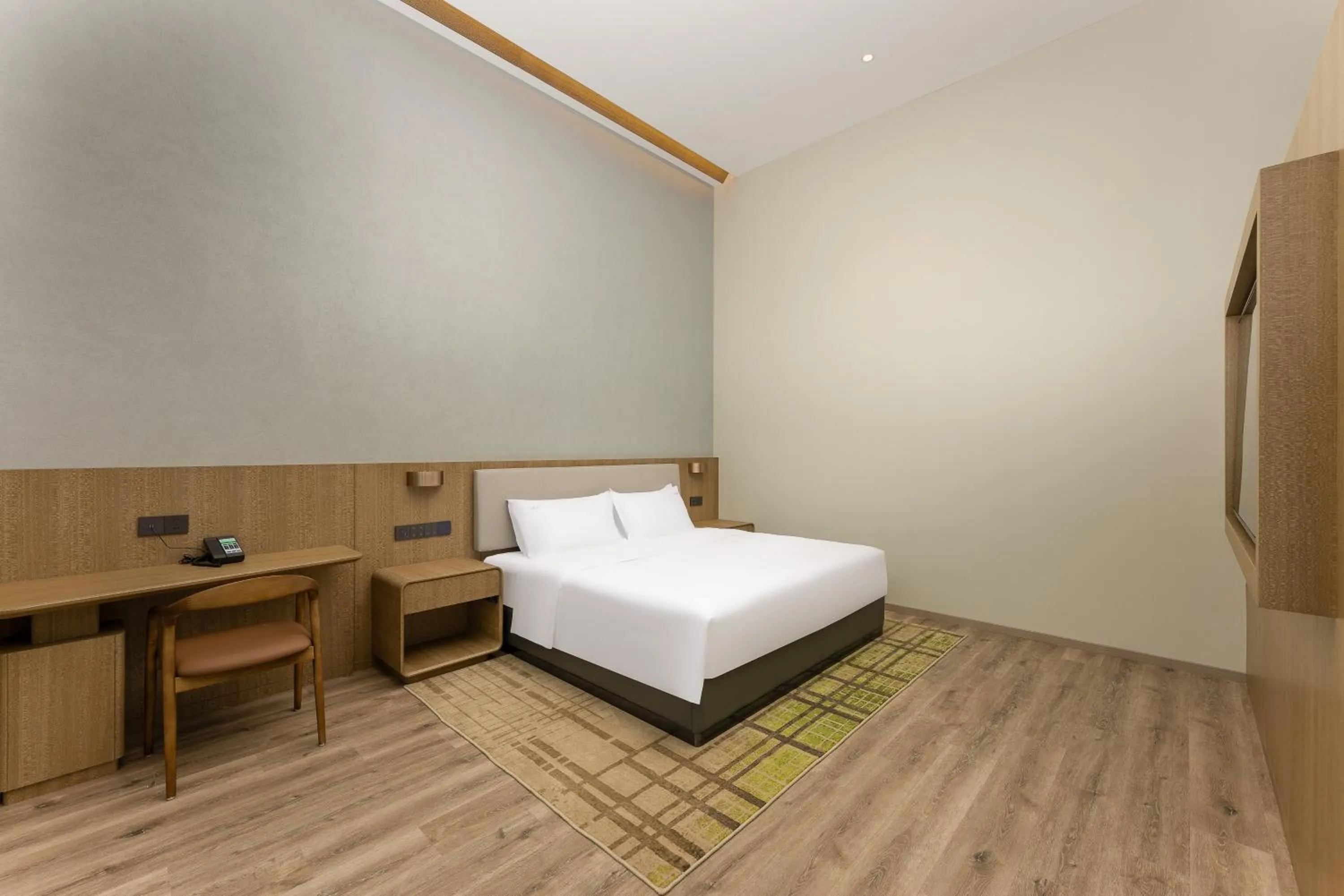 Photo of the whole room, Bed in Holiday Inn Jiuhua Mountain Hot Spring by IHG