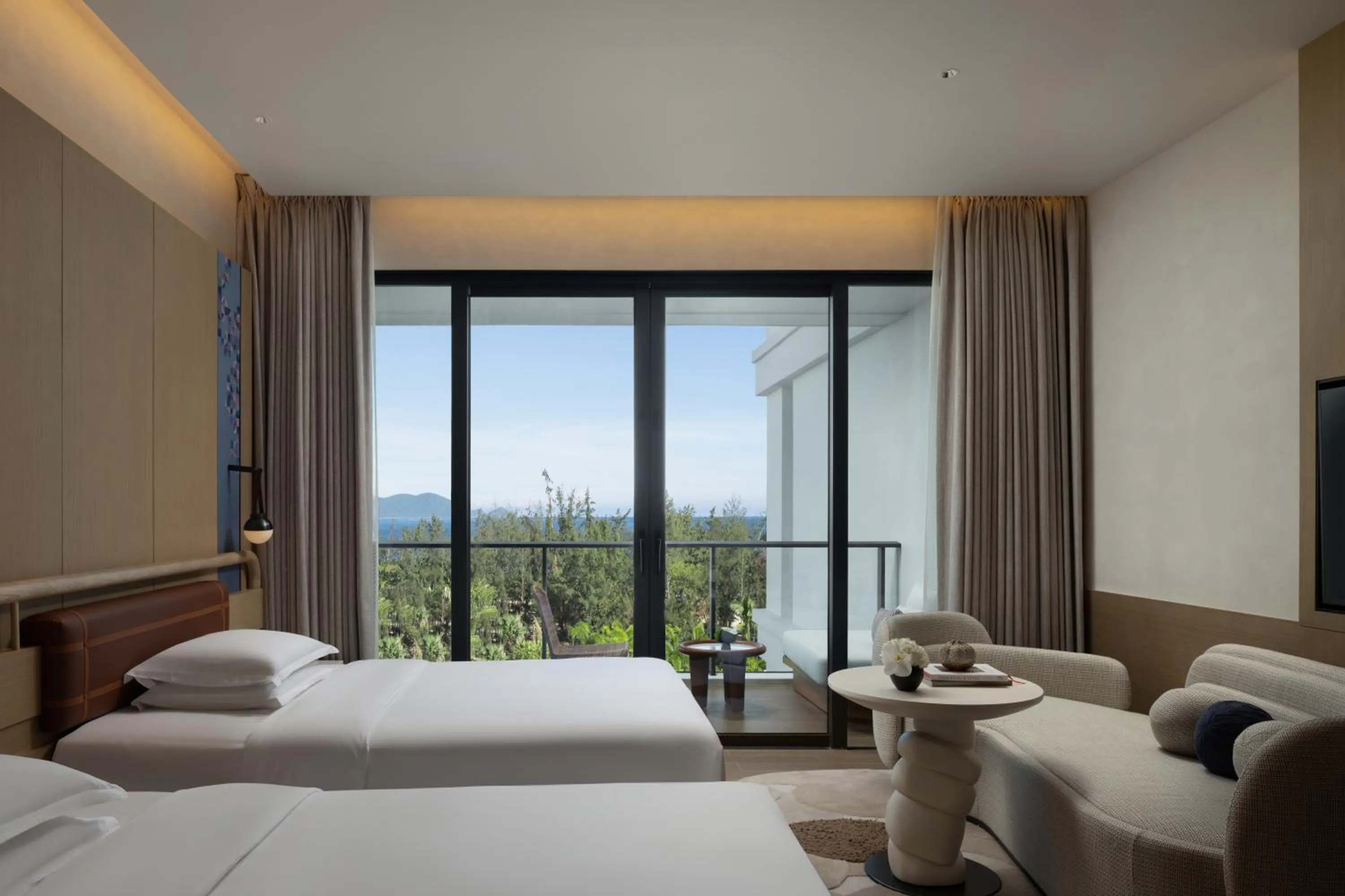 Photo of the whole room, Bed in Hotel Indigo Hainan Clear Water Bay by IHG