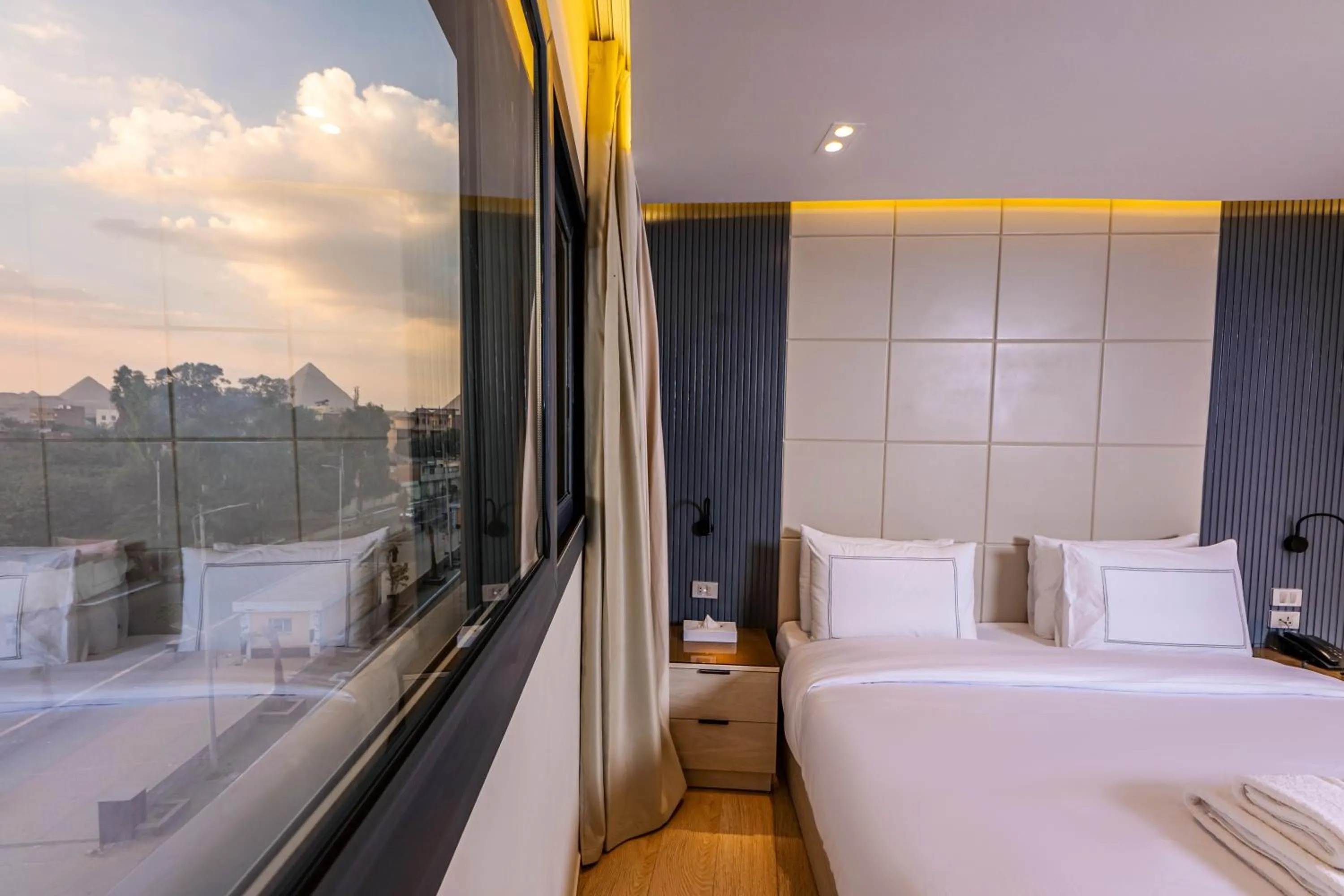 Bed in Remal Pyramids Hotel