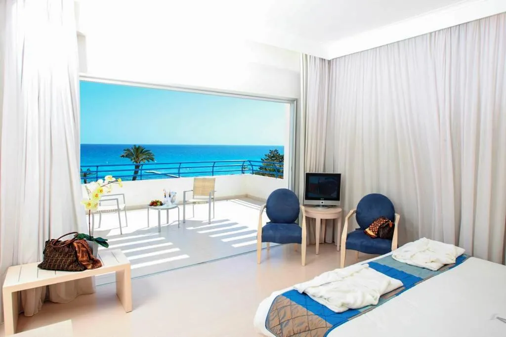 Bed in Vrissiana Boutique Beach Hotel