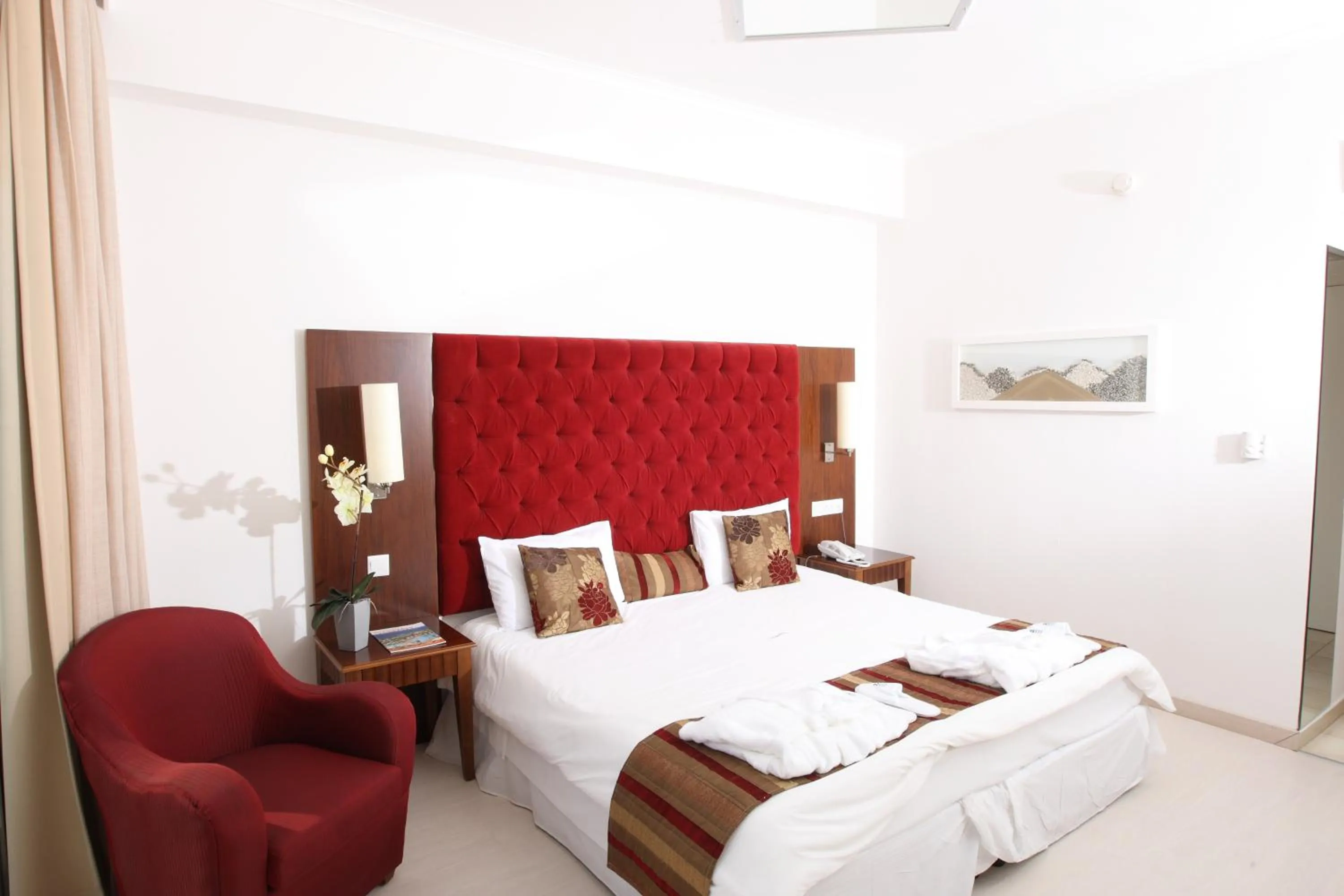 Bed in Vrissiana Boutique Beach Hotel