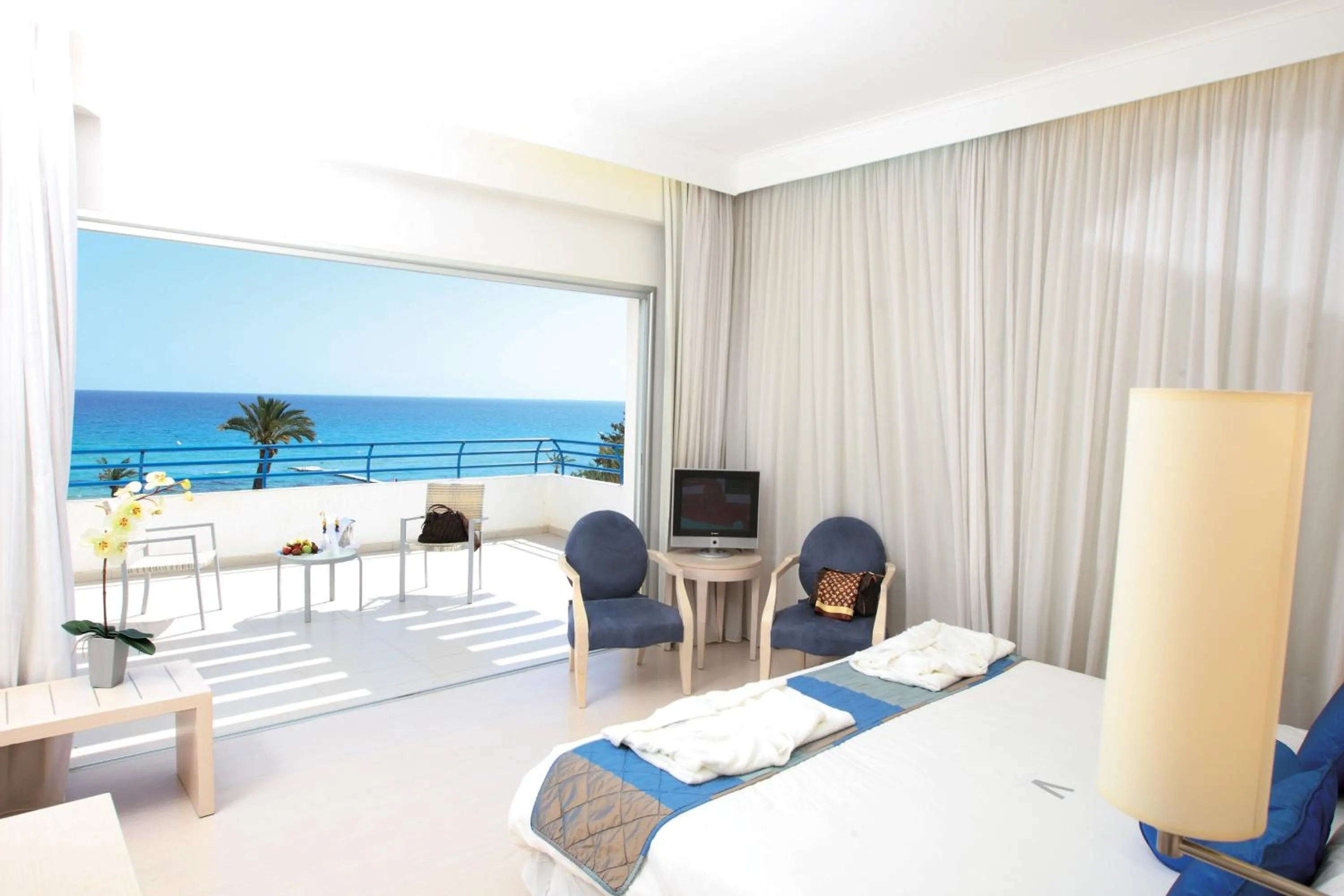 Bed in Vrissiana Boutique Beach Hotel