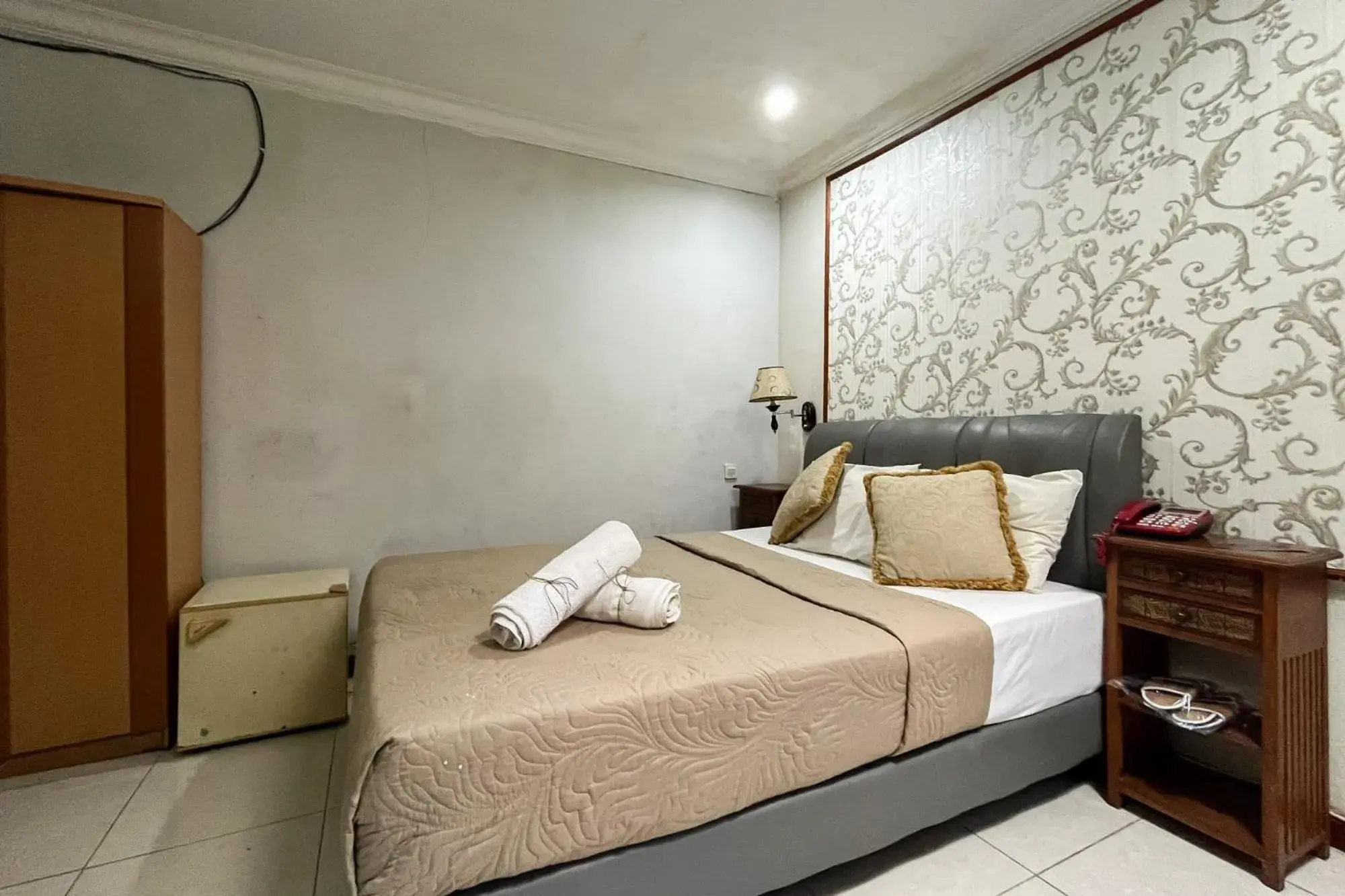 Bedroom, Bed in Urbanview de Dharmawangsa Suite Hotel Bedroom, Bed in Urbanview de Dharmawangsa Suite Hotel