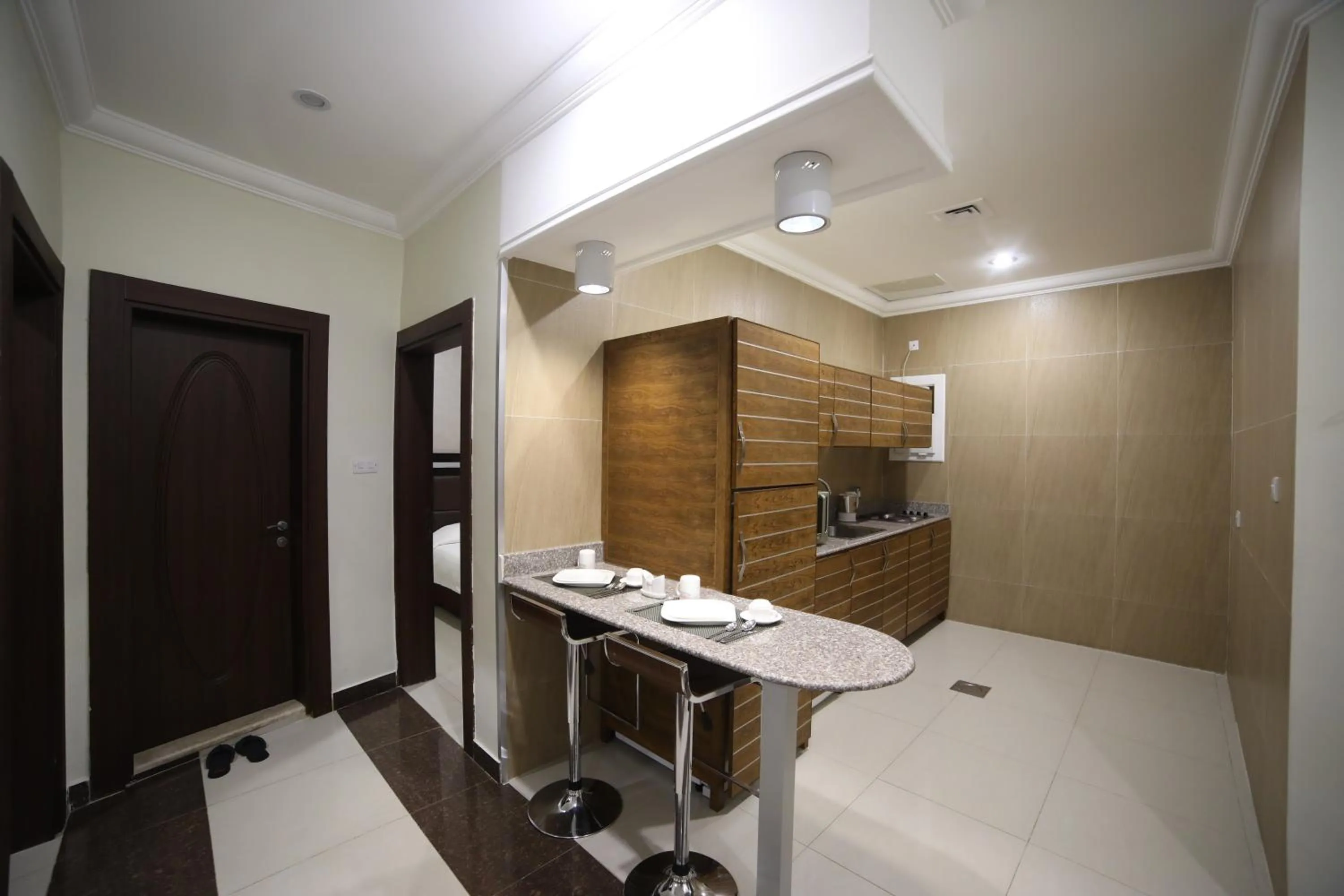 Kitchen or kitchenette in وهج للشقق الفندقية Wahaj Hotel Apartments 2