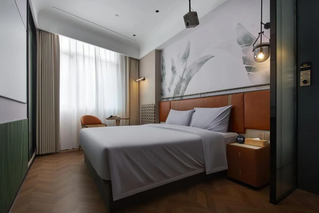 Bed in Renjoy Hotel -Xiamen Zhongshan Road Pedestrian Street