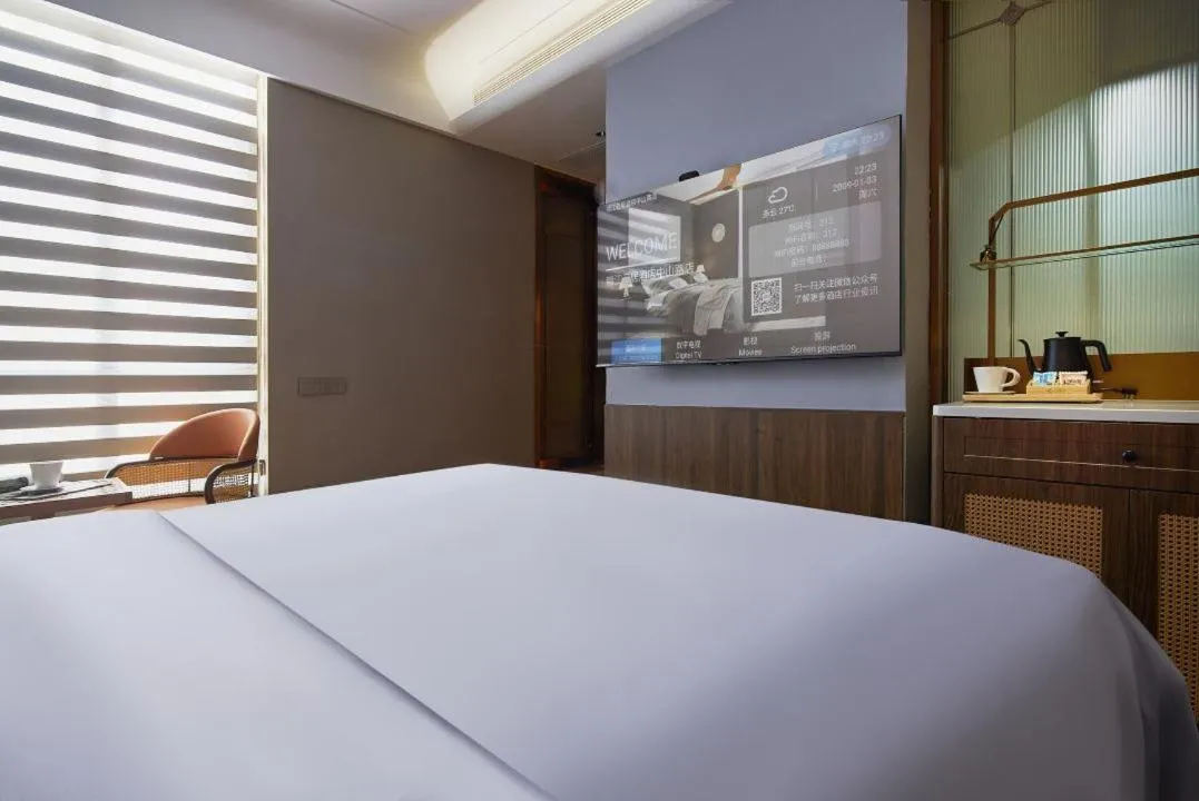 Bed in Renjoy Hotel -Xiamen Zhongshan Road Pedestrian Street