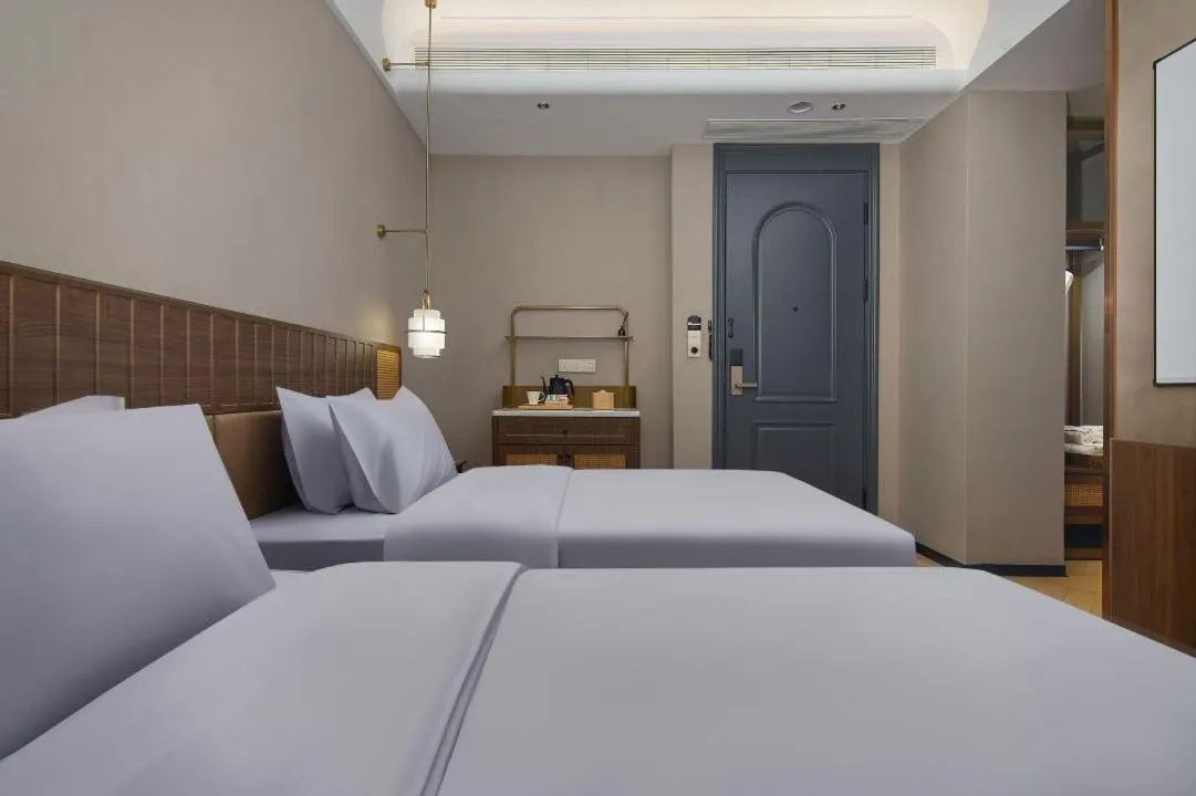 Bed in Renjoy Hotel -Xiamen Zhongshan Road Pedestrian Street