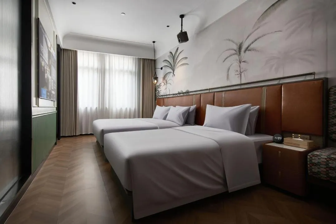 Bed in Renjoy Hotel -Xiamen Zhongshan Road Pedestrian Street