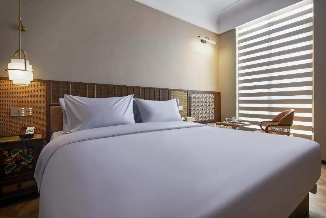 Bed in Renjoy Hotel -Xiamen Zhongshan Road Pedestrian Street