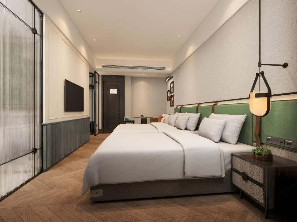 Bed in Renjoy Hotel -Xiamen Zhongshan Road Pedestrian Street