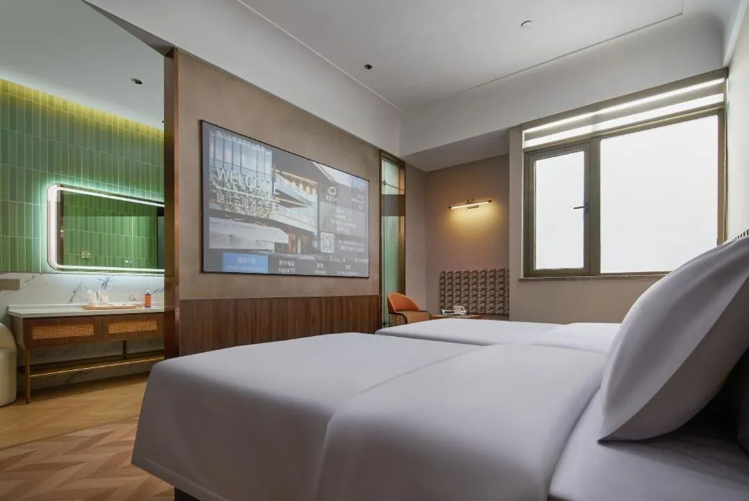 Bed in Renjoy Hotel -Xiamen Zhongshan Road Pedestrian Street