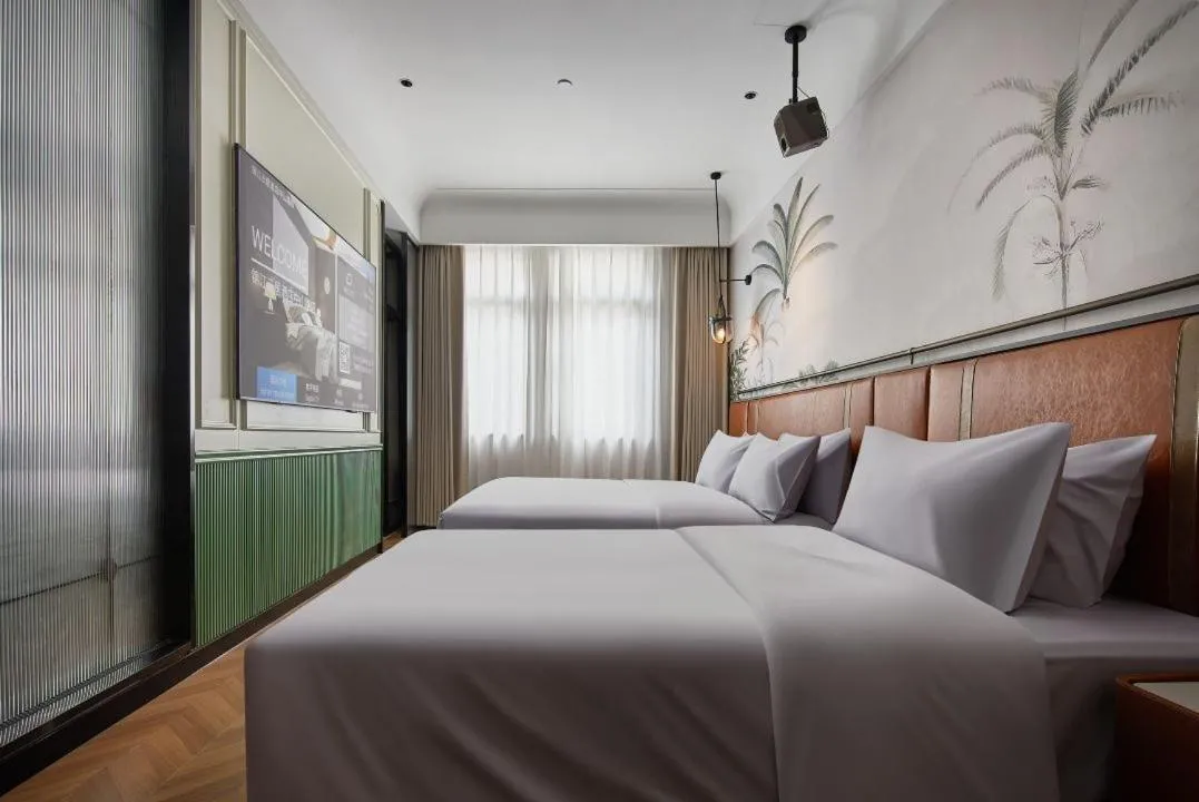 Bed in Renjoy Hotel -Xiamen Zhongshan Road Pedestrian Street