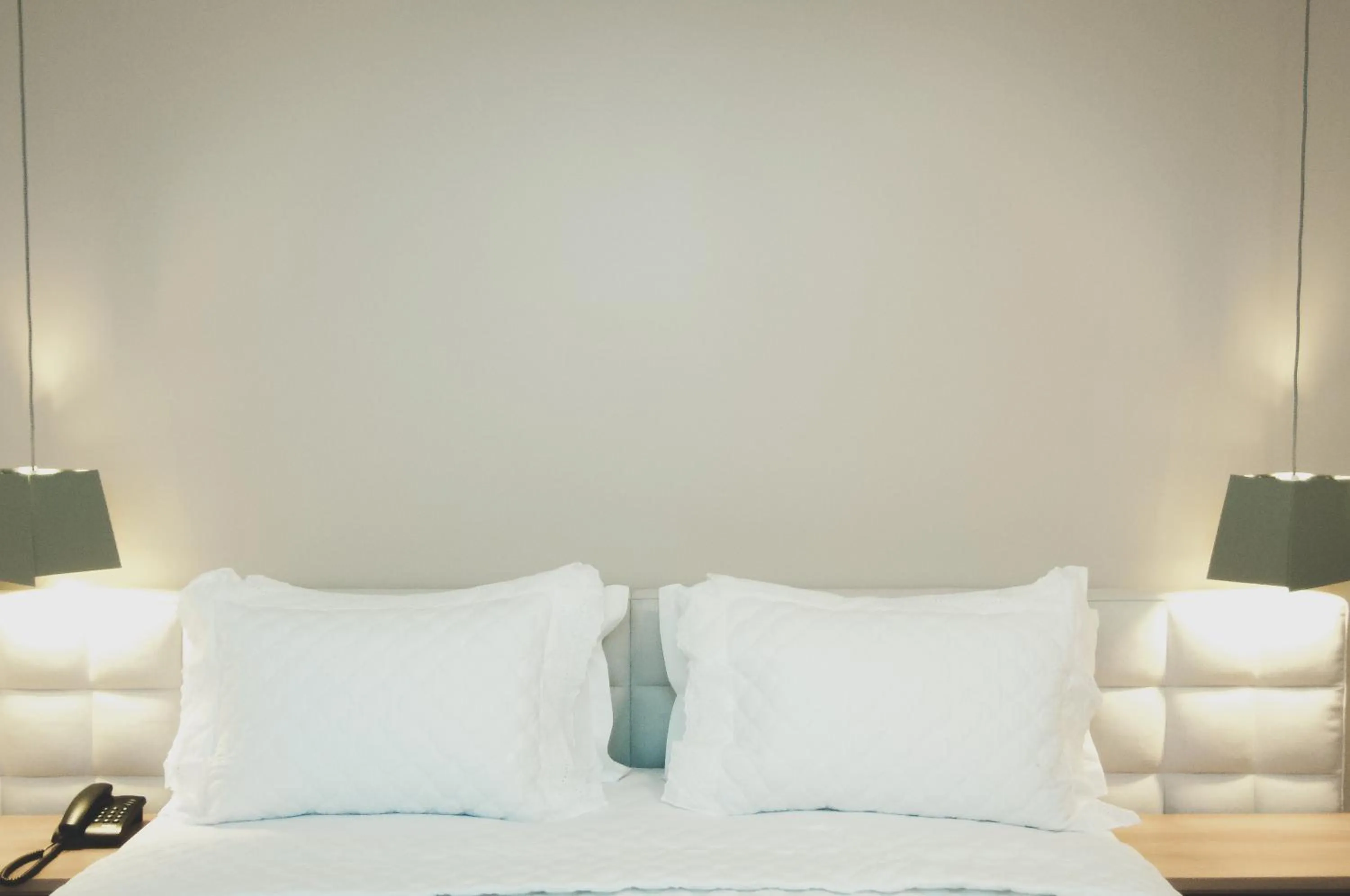 Bed in Nobile Suites Gran Lumni