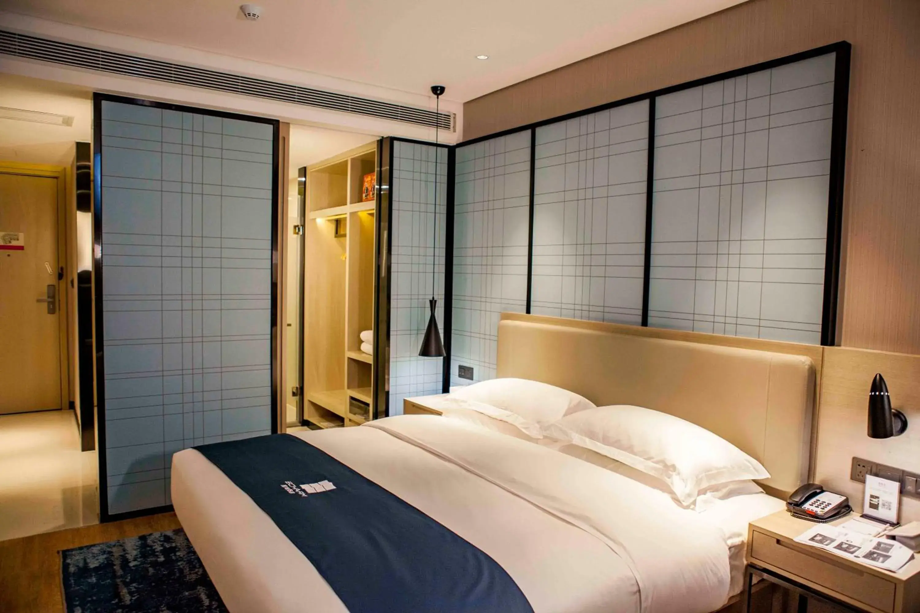 Photo of the whole room, Bed in Echarm Hotel Dongxing Minzu Road Photo of the whole room, Bed in Echarm Hotel Dongxing Minzu Road