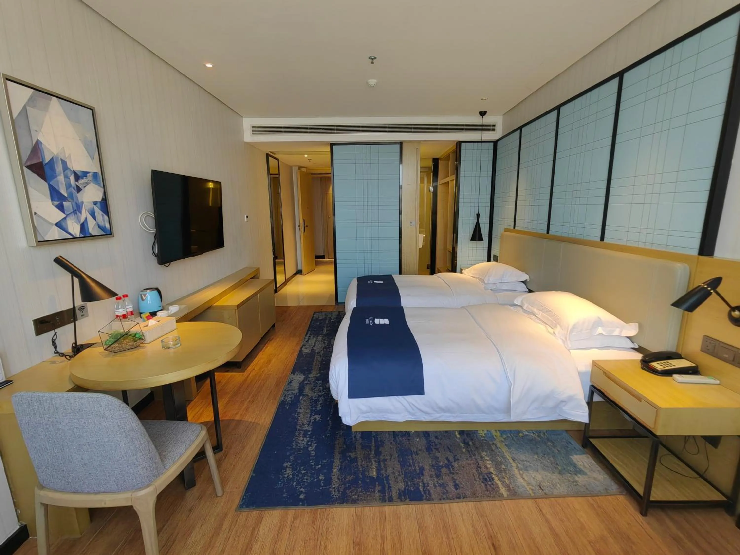 Photo of the whole room, Bed in Echarm Hotel Dongxing Minzu Road