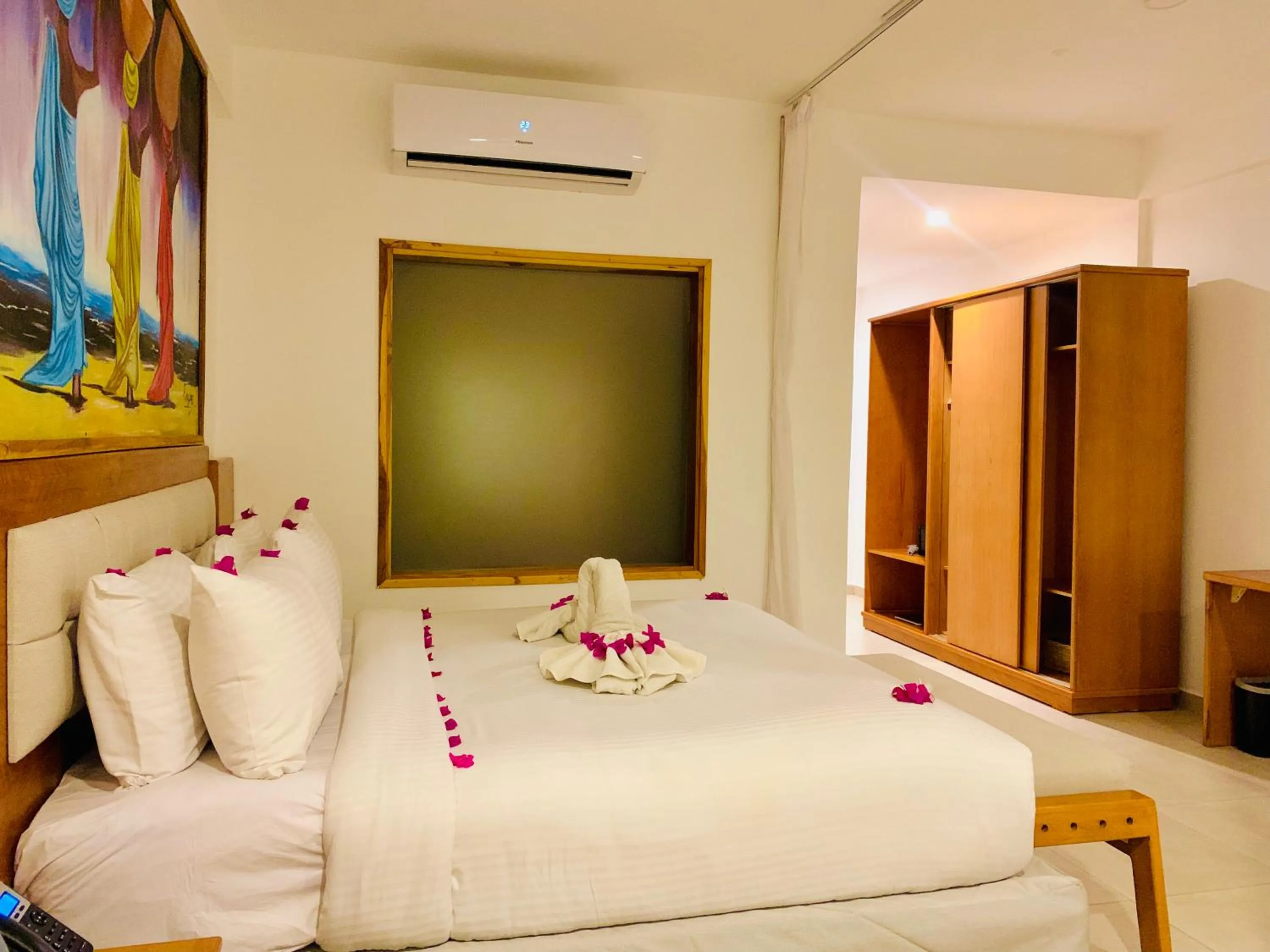 Bed in Royal Mandarin Hotel & Resort Zanzibar