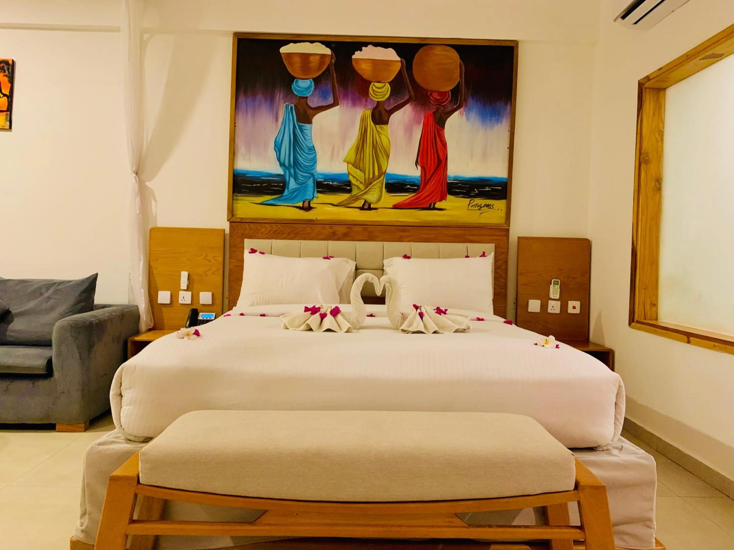 Bed in Royal Mandarin Hotel & Resort Zanzibar