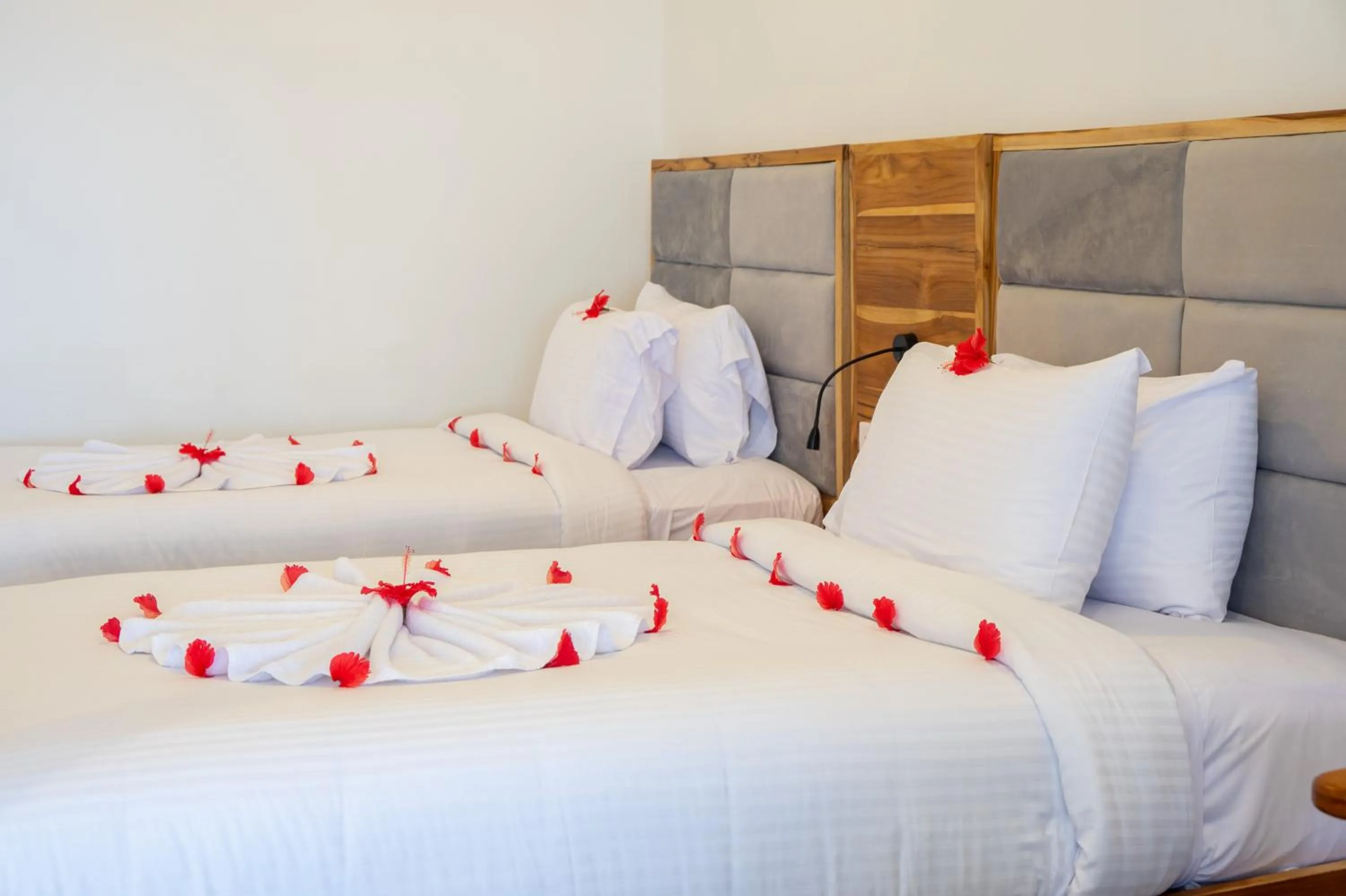 Bed in Royal Mandarin Hotel & Resort