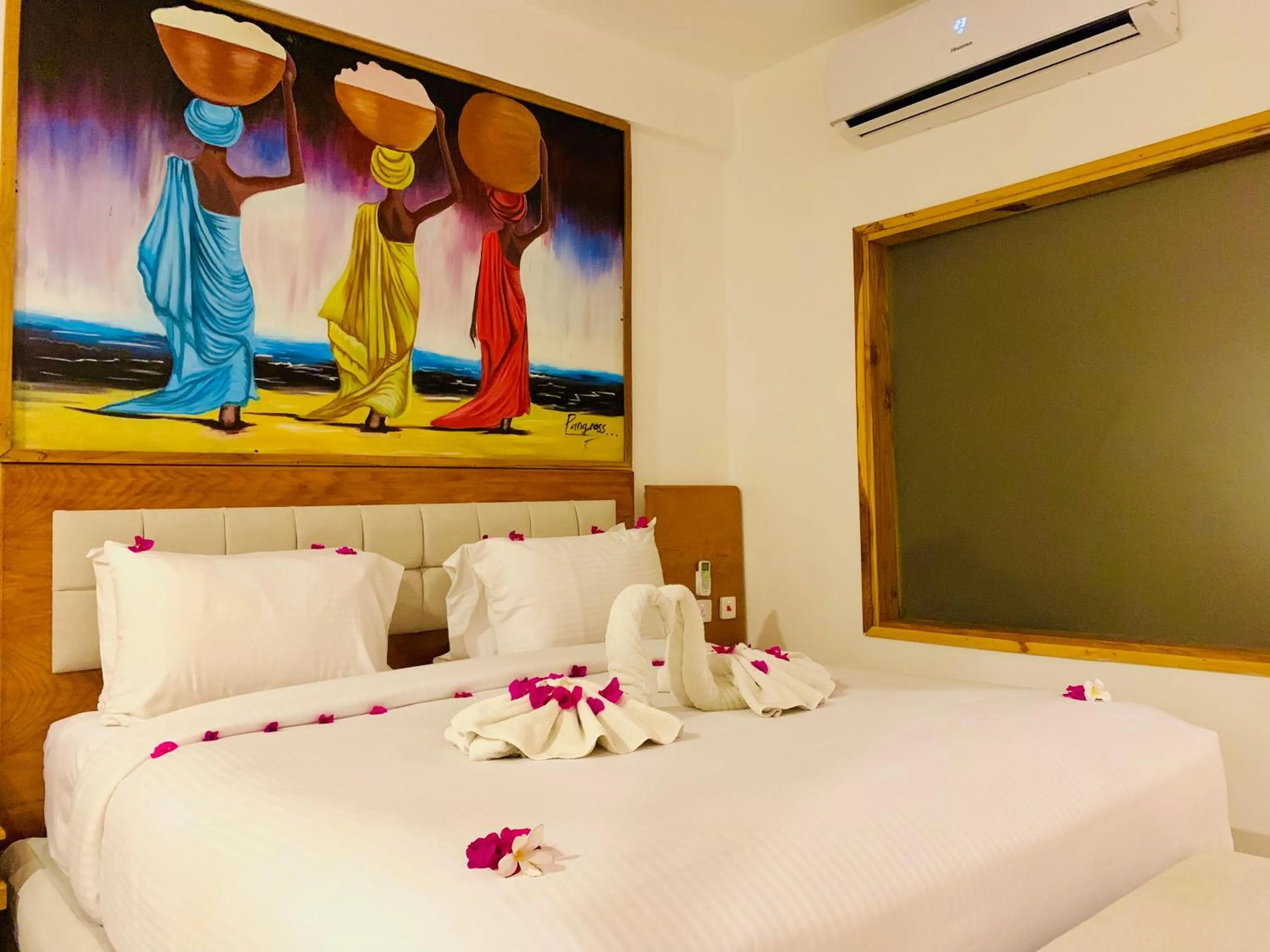 Bed in Royal Mandarin Hotel & Resort Zanzibar