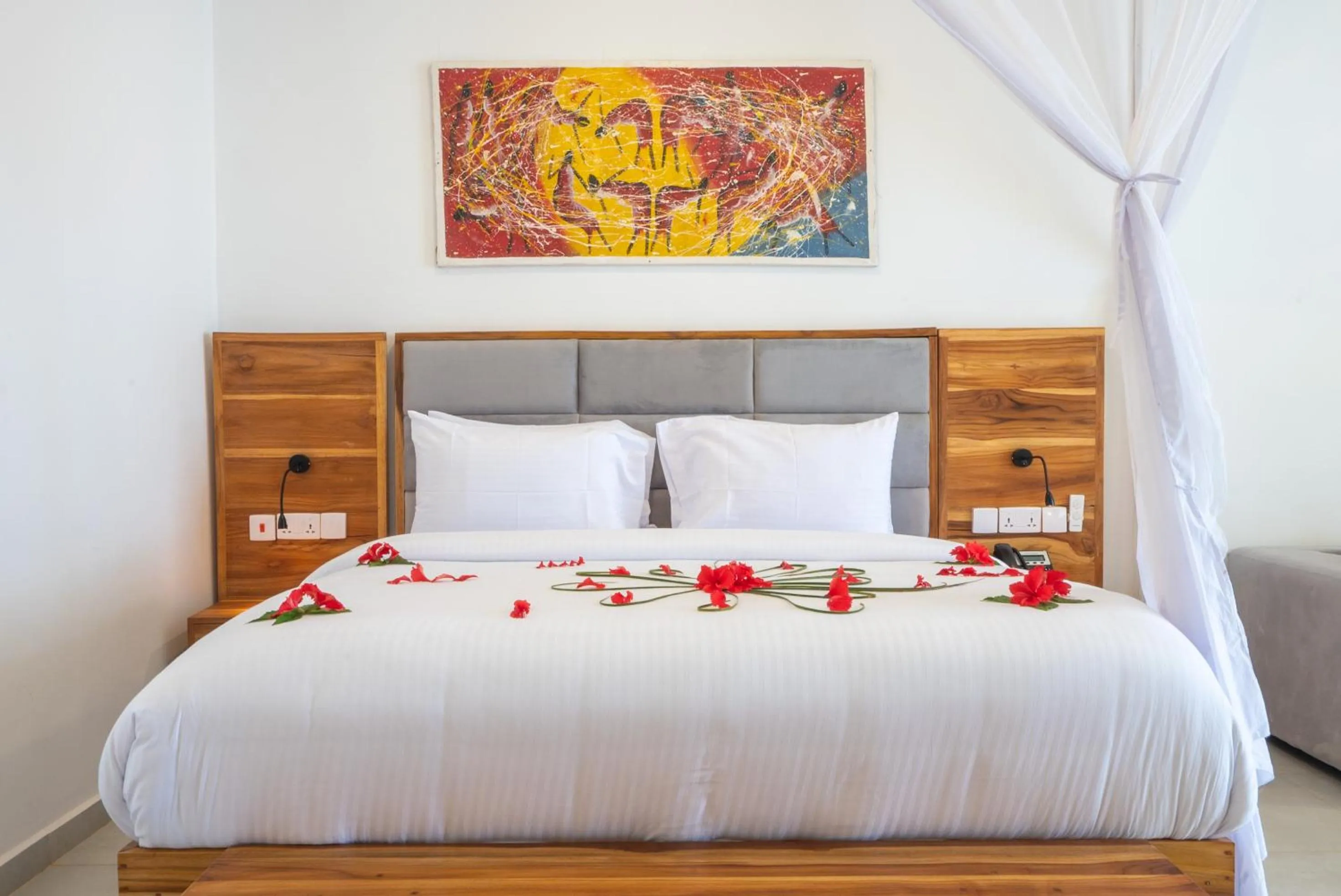 Bed in Royal Mandarin Hotel & Resort