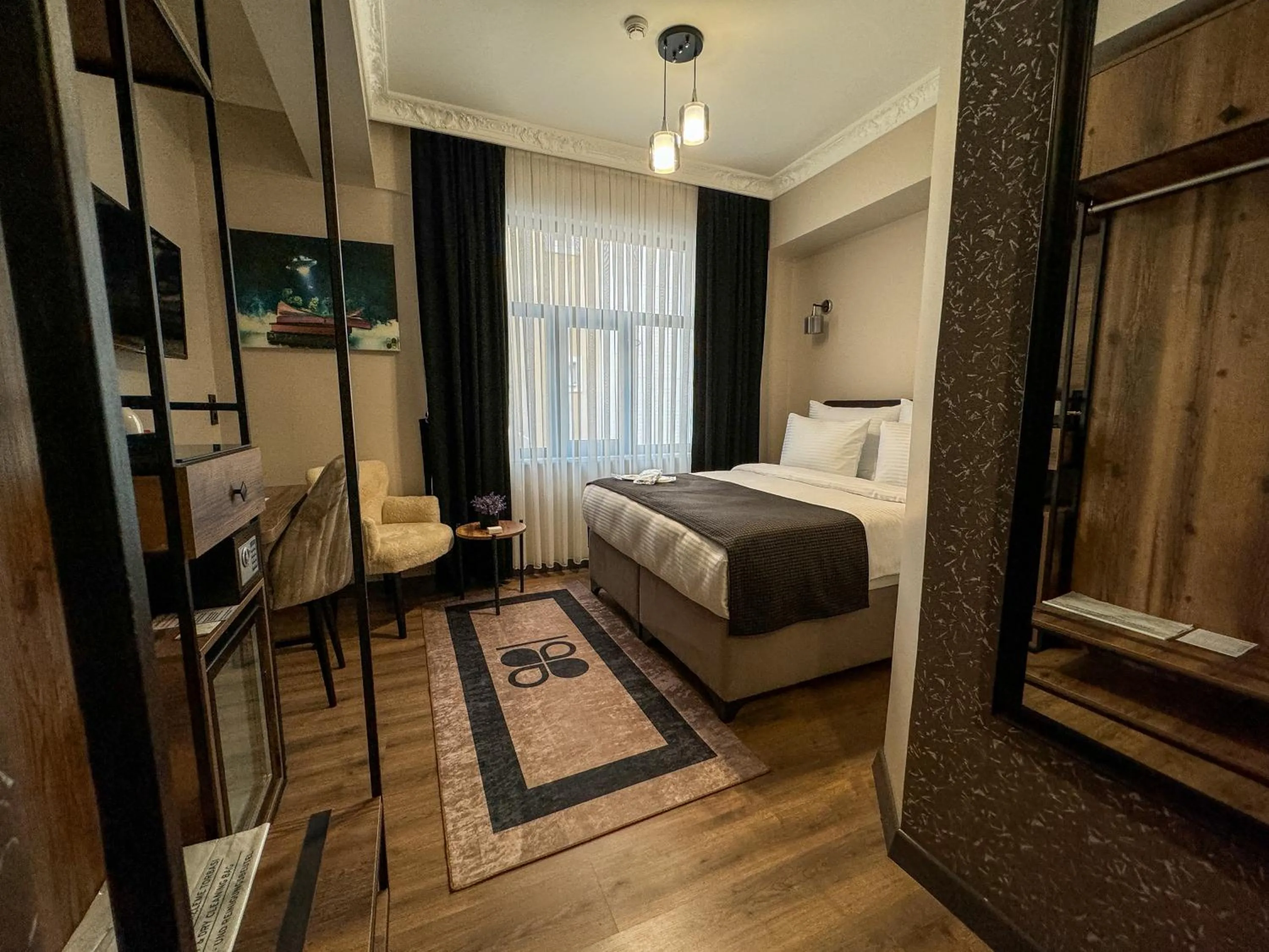 Bed in Grand CLOVER Hotel