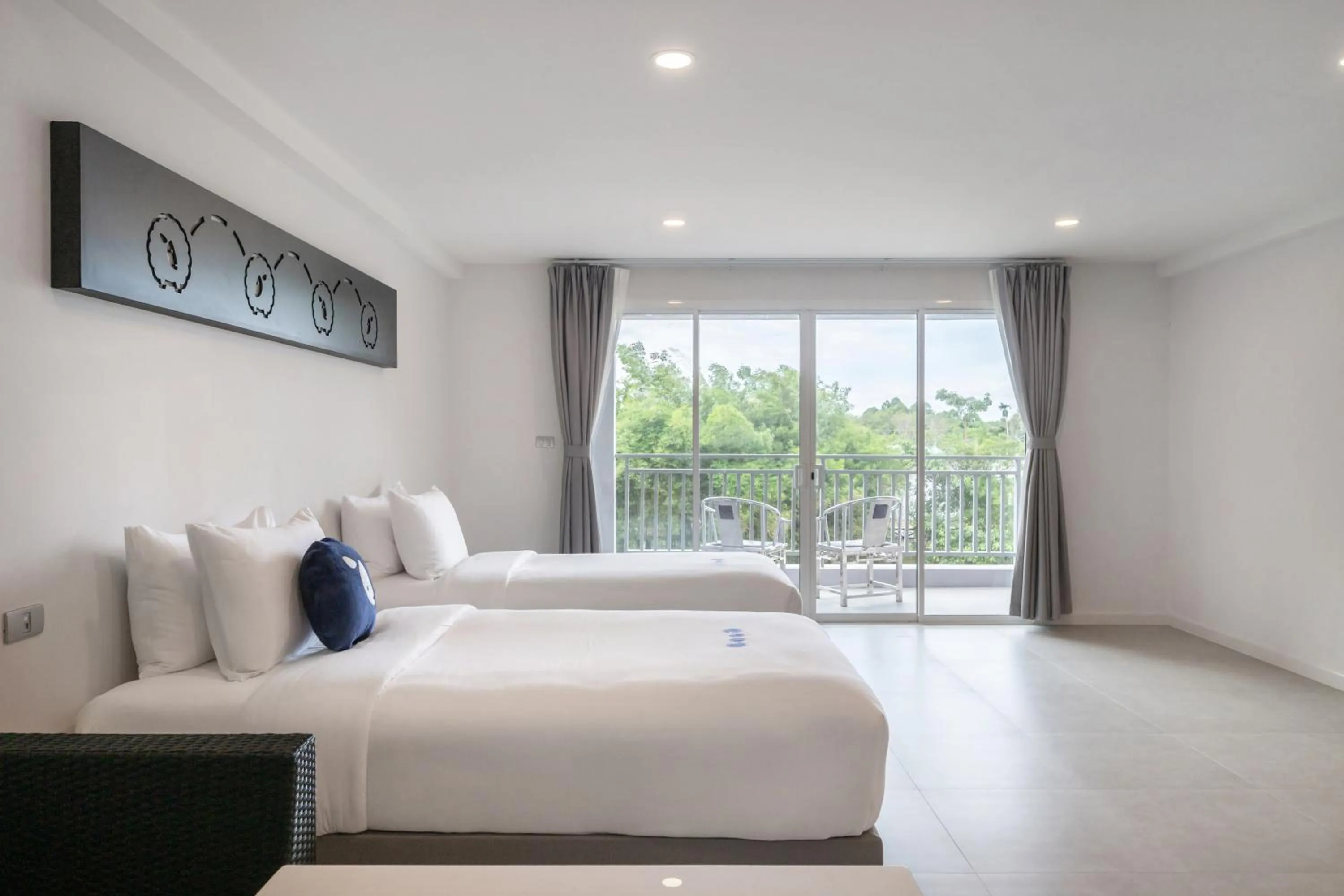 Bed in Kokotel Khao Lak Isara Casa