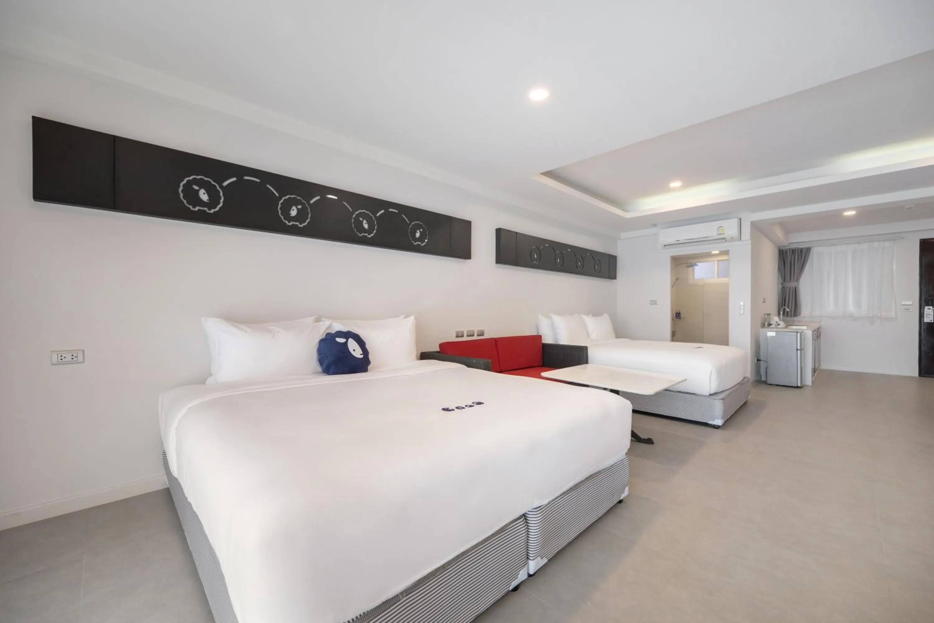 Bed in Kokotel Khao Lak Isara Casa